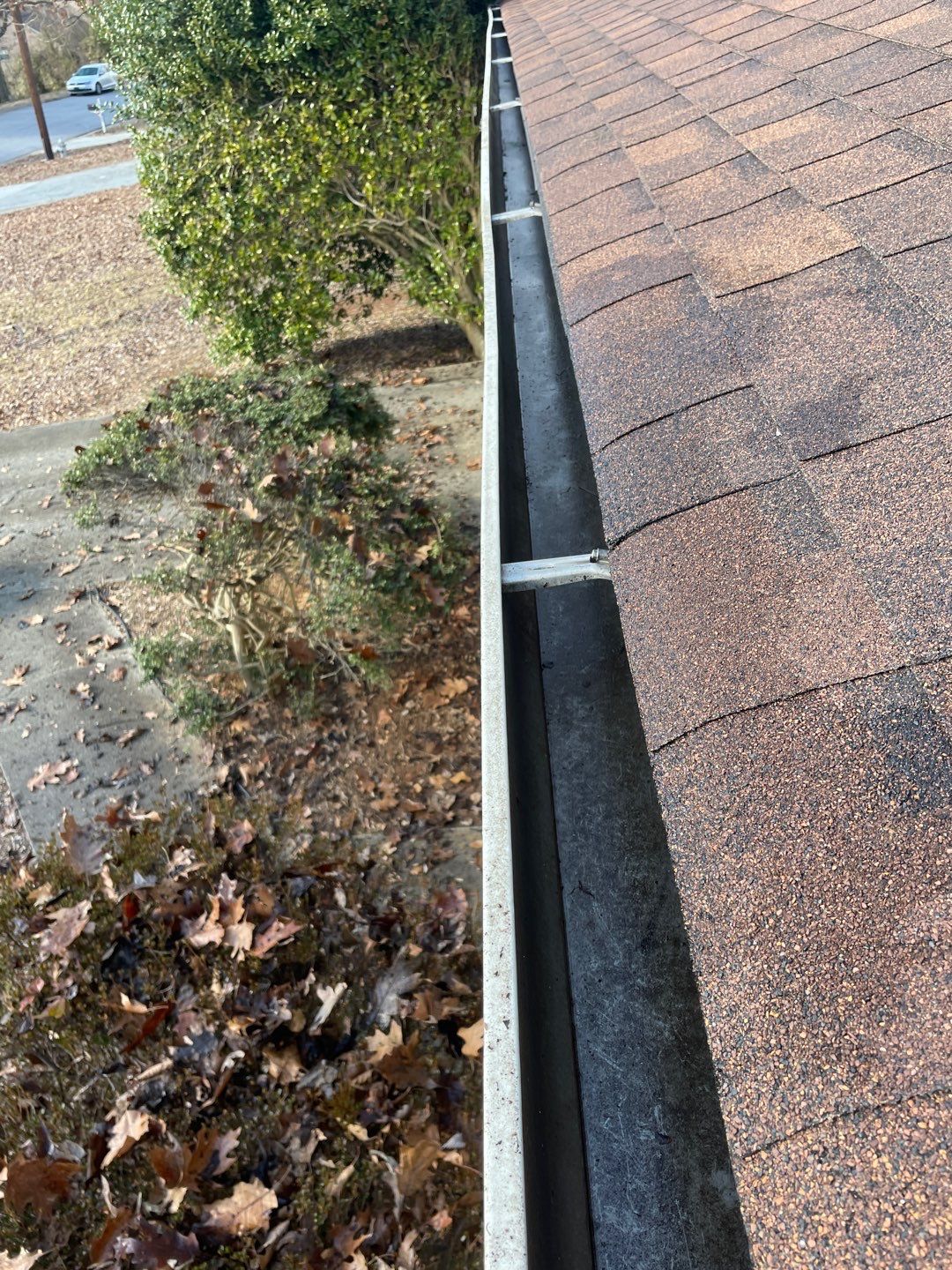 Cleaning Gutters  by Deerfield Roofing LLC