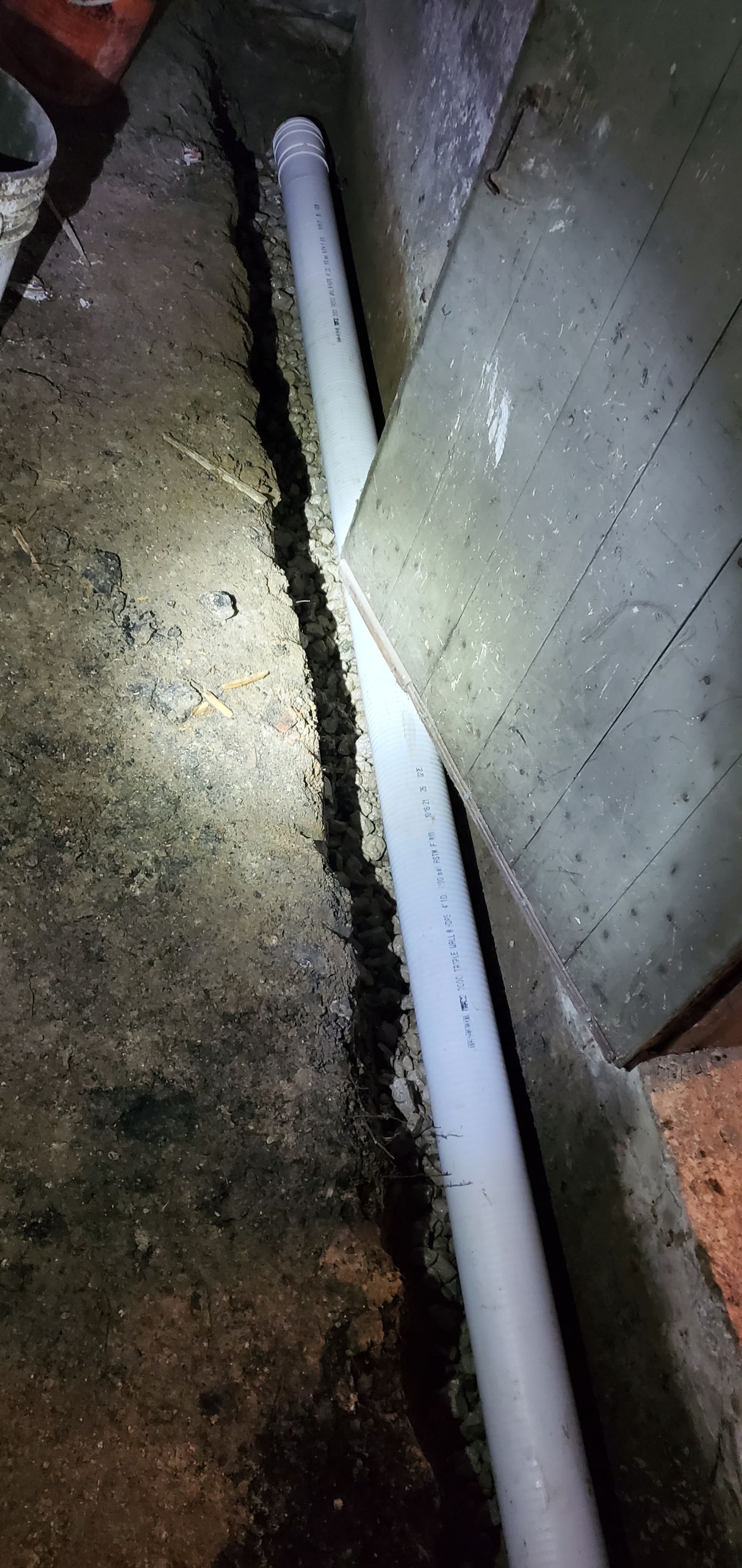 Interior Basement Waterproofing System using GrateDrain Waterproofing System by Toledo Basement Repair 
