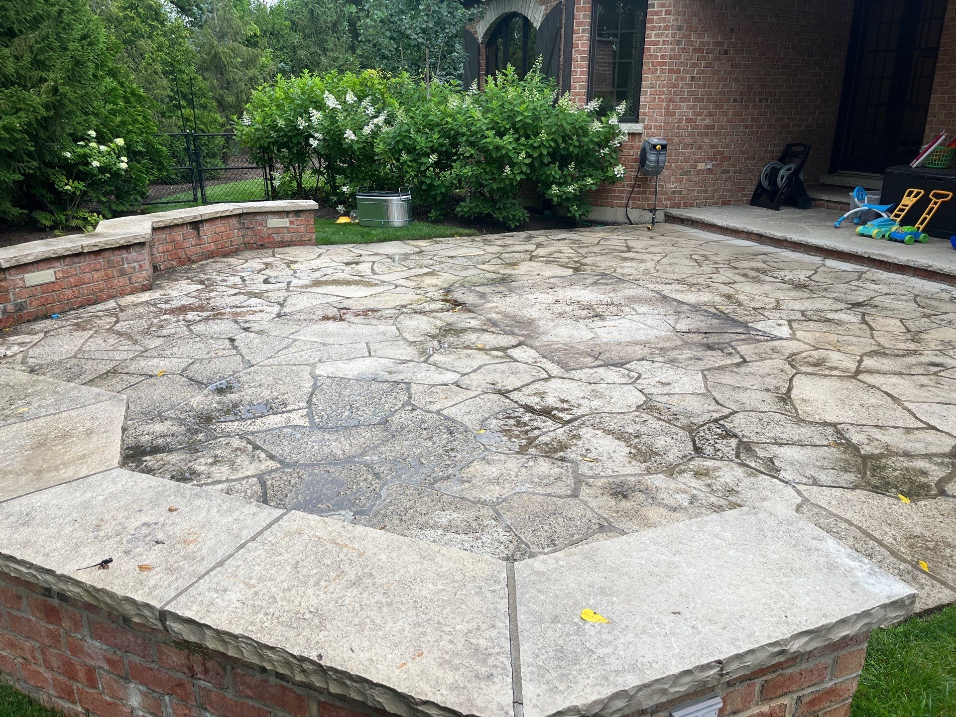 natural stone using Algaecide, soft wash soap by Northern Power Washing LLC.