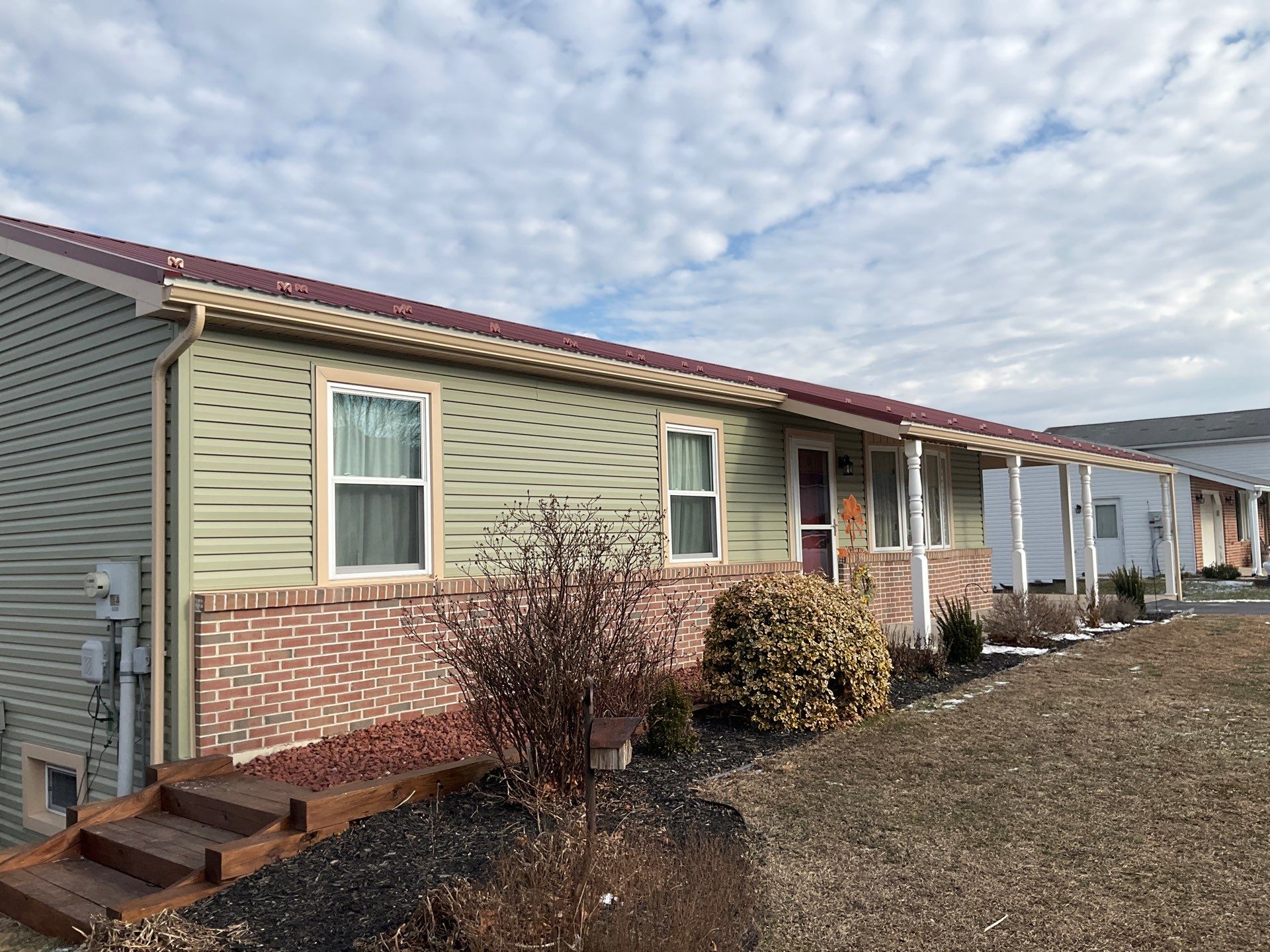 Vinyl Siding Replacement and Patio Door Installation in Elizabethville by Esh Builders