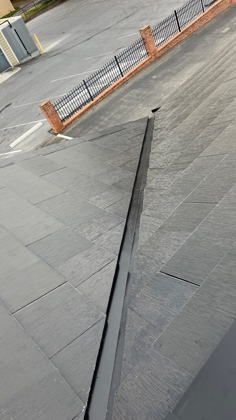 Tesla Solar Roof on a Commercial Building by American Home Contractors