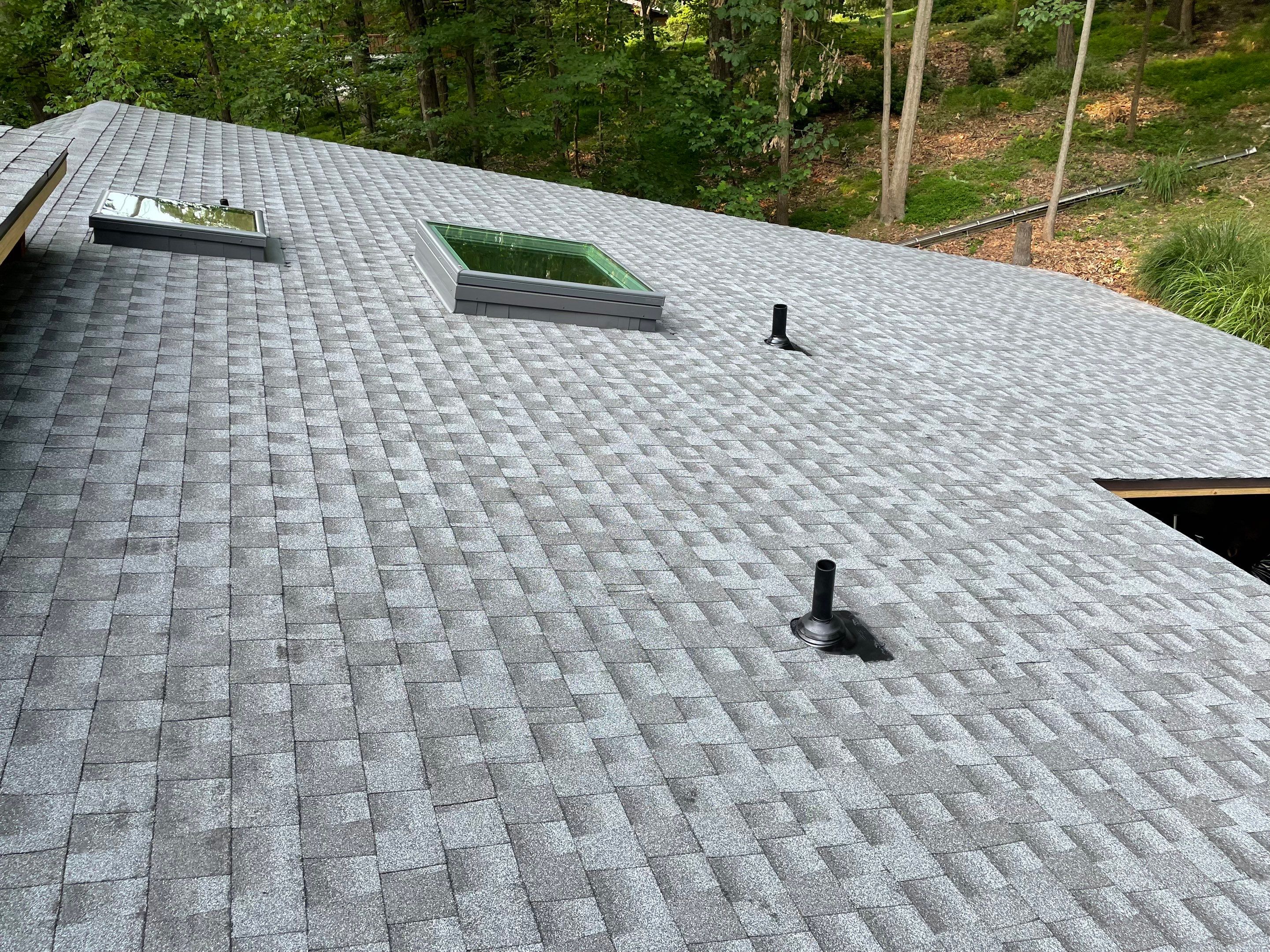 Deckhouse Roof Replacement by American Home Contractors