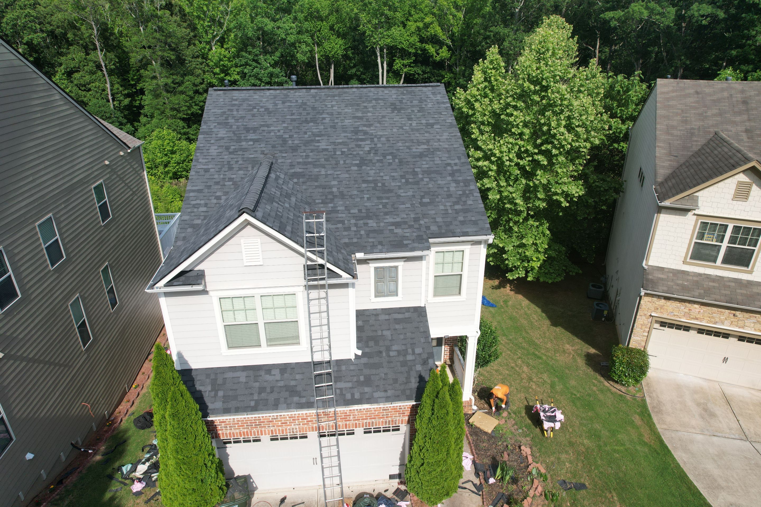 Residential Roof Replacement using Owens Corning Trudef Twilight Black by Inspector Roofing and Restoration