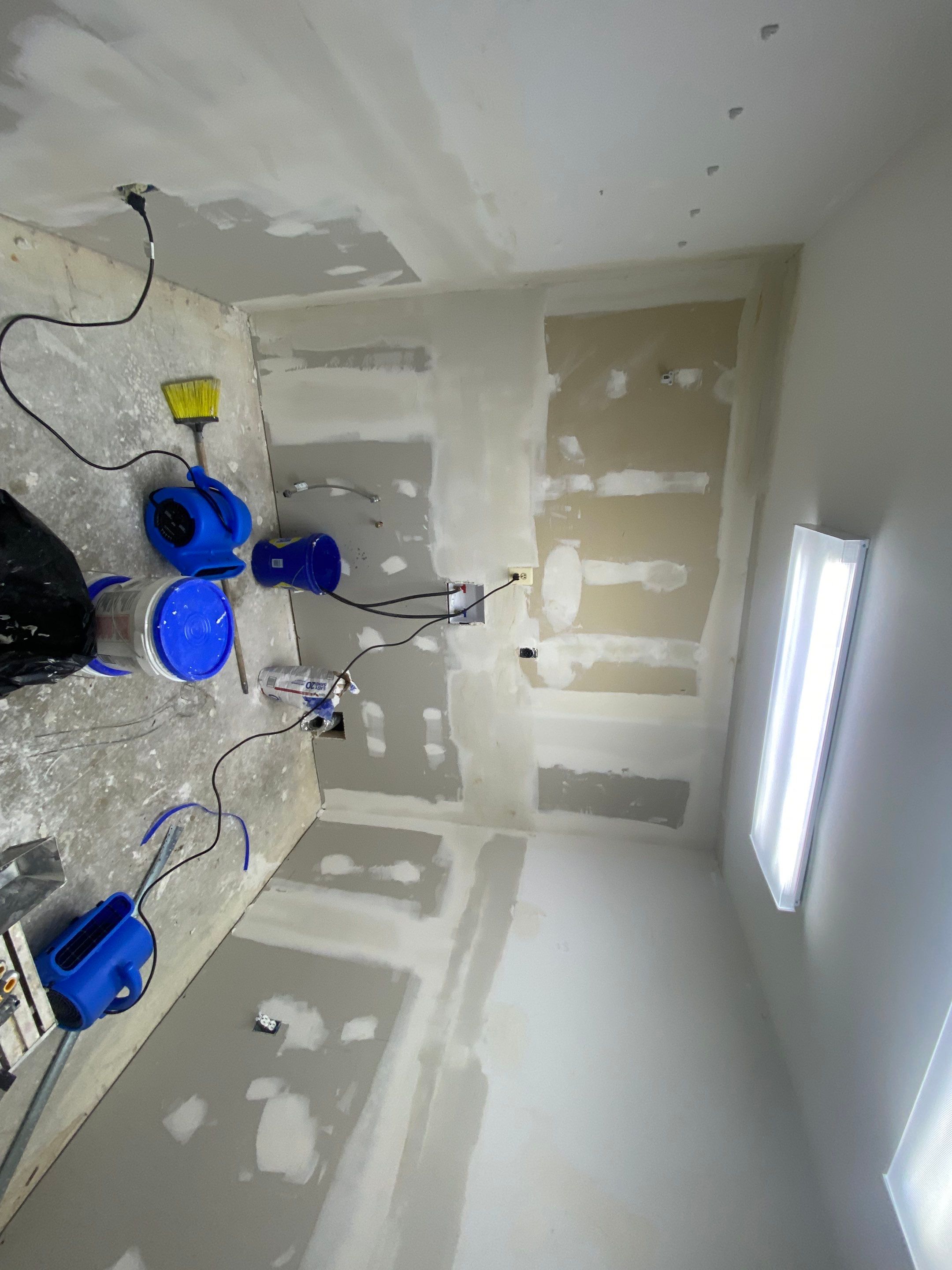 Laundry Room Redmodel using Lifeproof Luxury Vinyl Plank Flooring by The Smet Companies, LLC