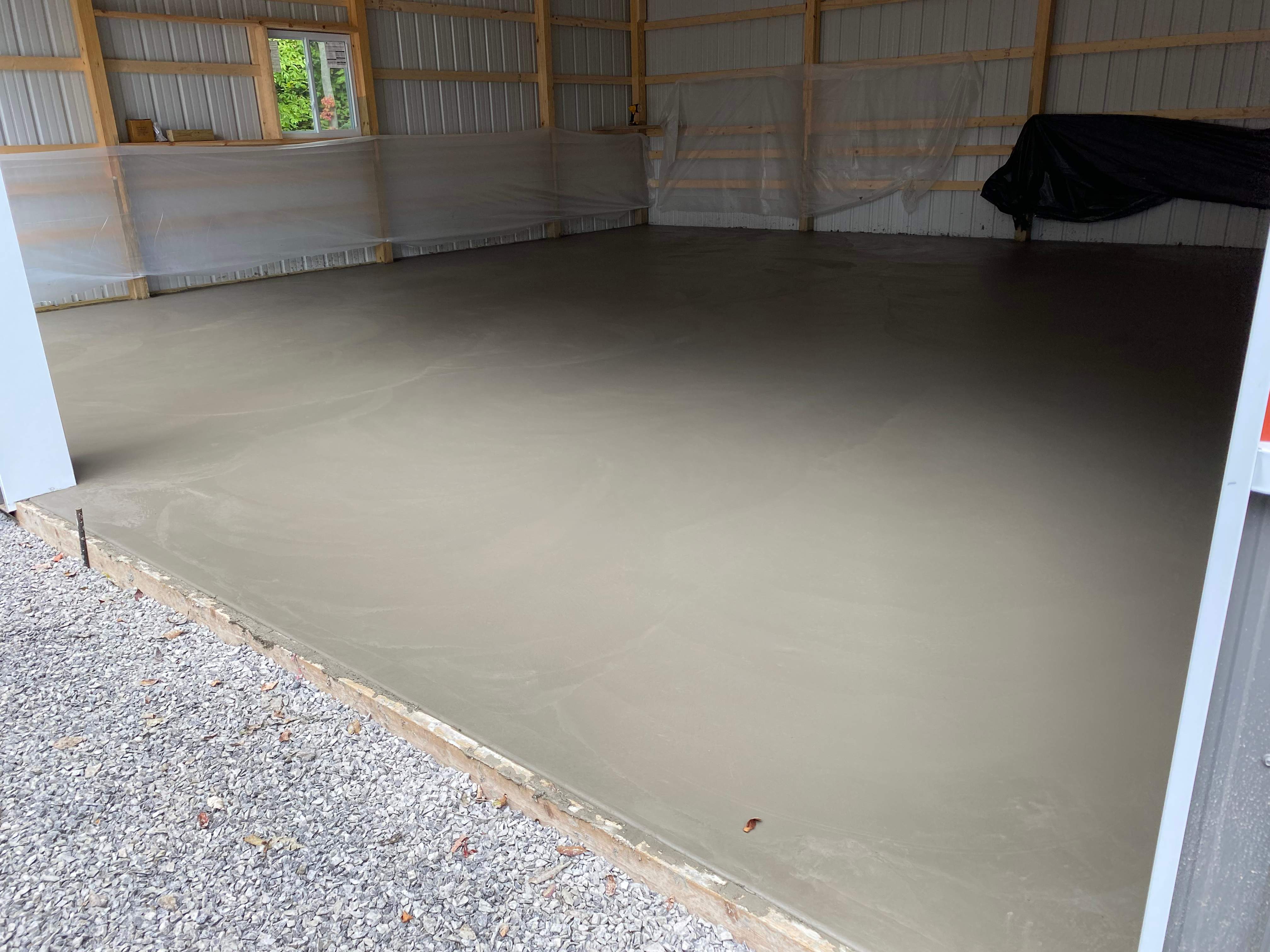 Pole barn floor  by NG Masonry & Construction LLC