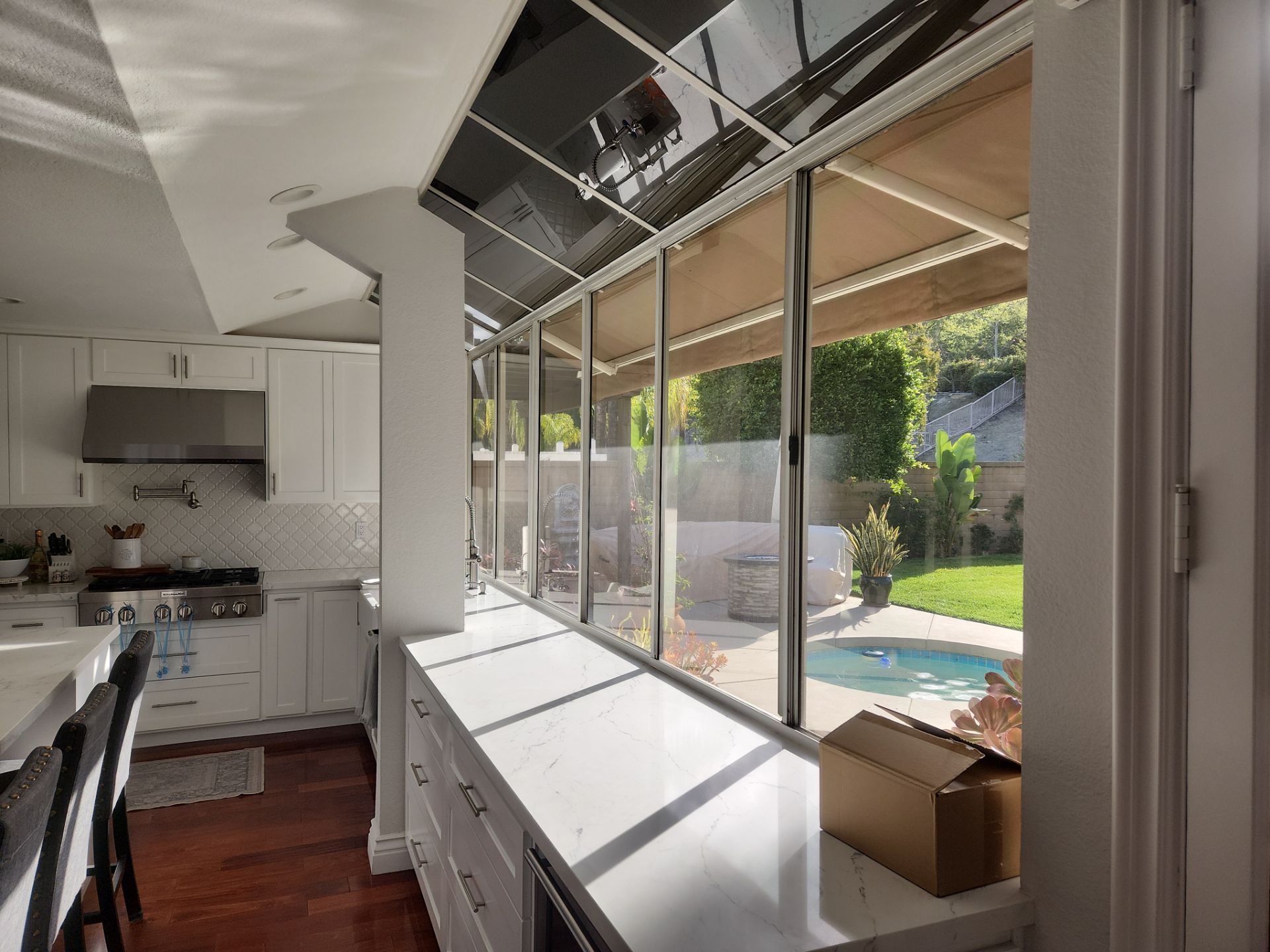 Window Installation using Anlin vinyl windows with Sunshield glass by American Window Company