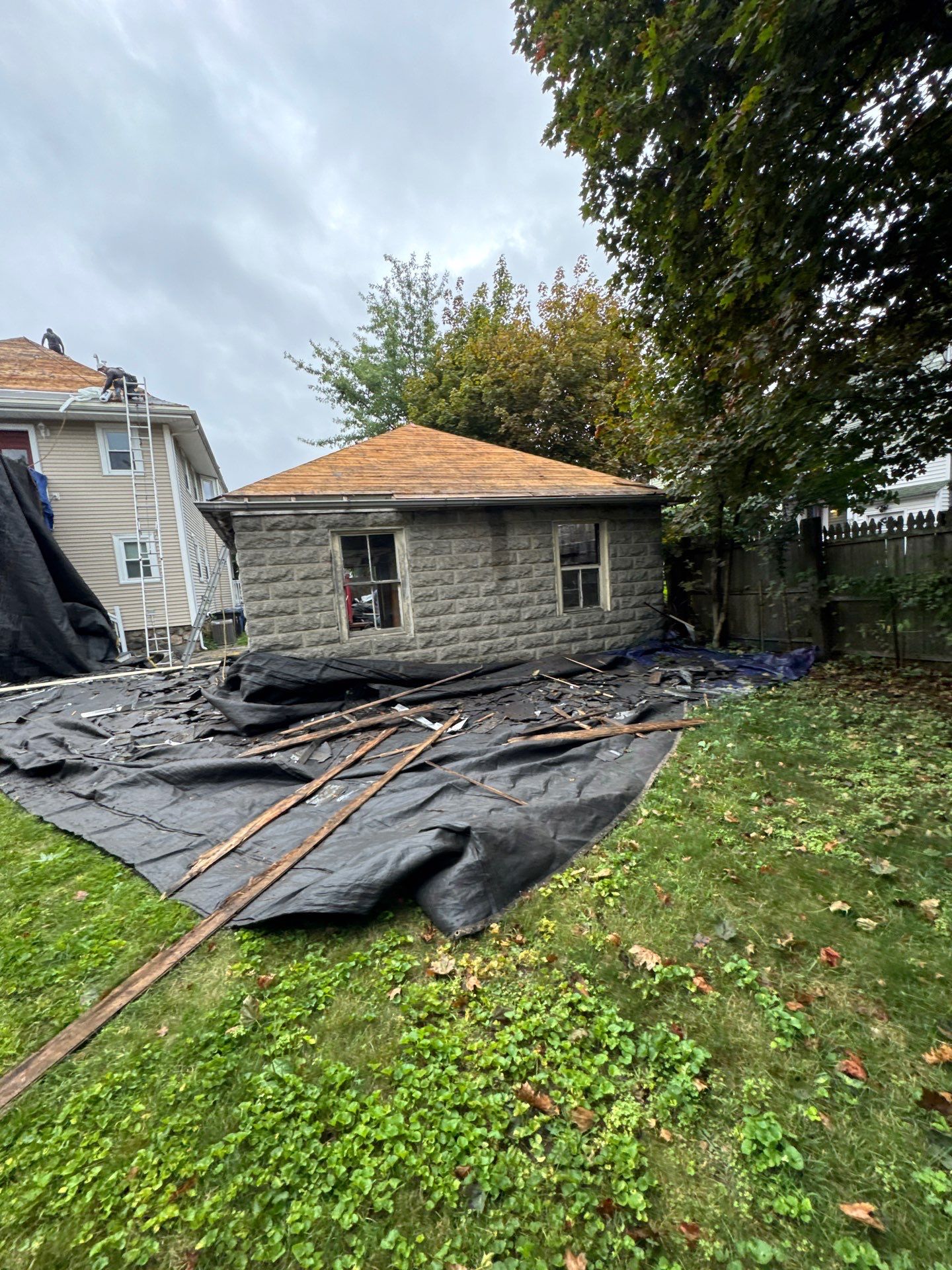 Roof Replacement with Skylight Flashing in Waltham, MA by Mighty Dog Roofing of Greater Middlesex County