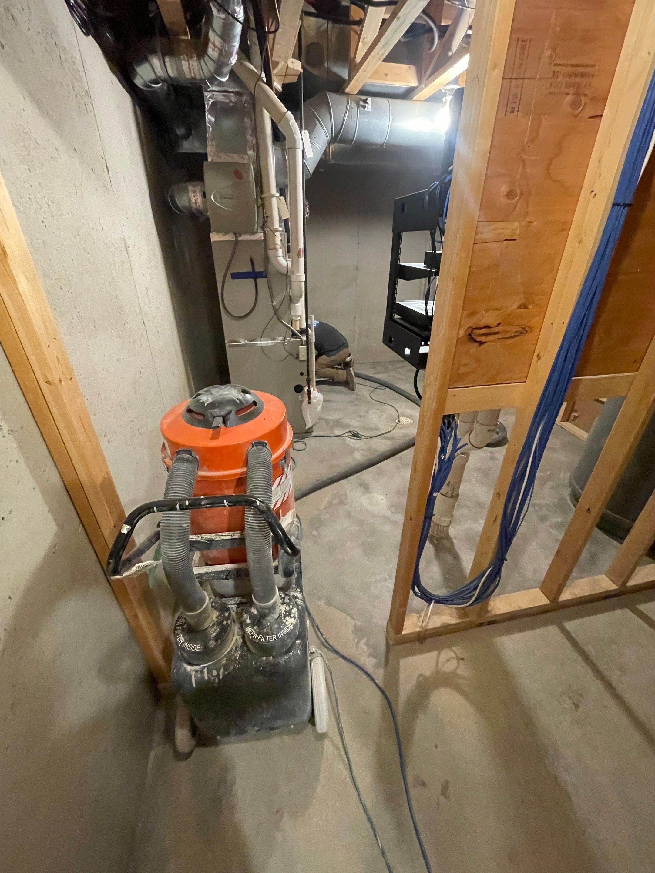 Sioux Falls Basement Floor Transformation with Durable Epoxy Flake Coating by Select Painting, Coatings & Garage Cabinets