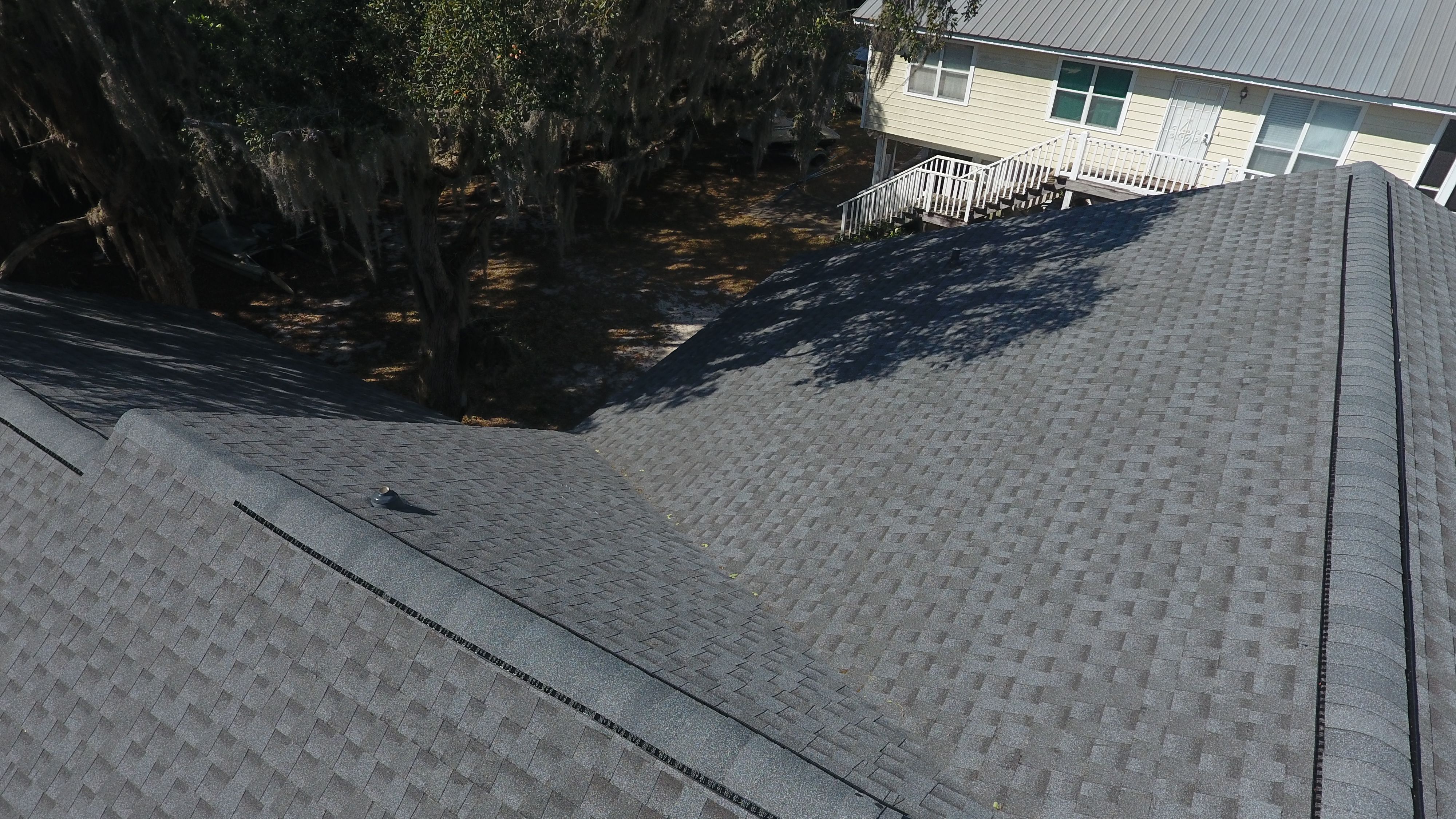 Residential Roofing Installation using Roof Replacement by American Roofing & Construction LLC