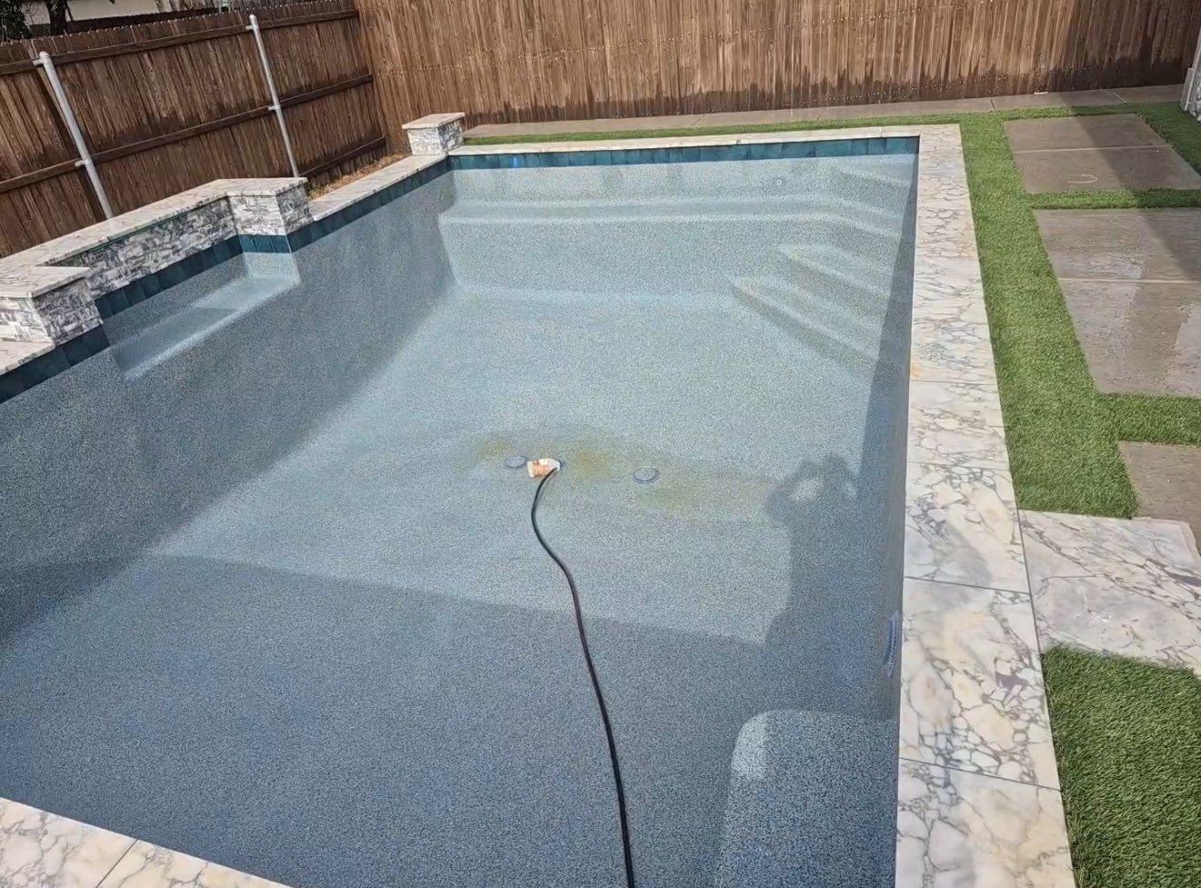 Geometric Pool with Raised Water Feature Wall and Turf by Pinnacle Pools and Spas - DFW