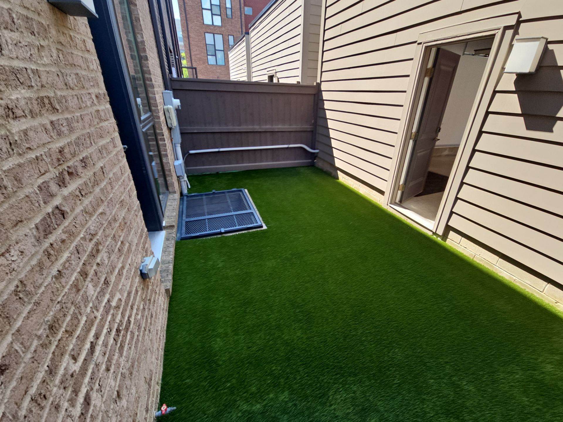 Small Townhome Courtyard Artificial Turf by Southwest Greens Midwest
