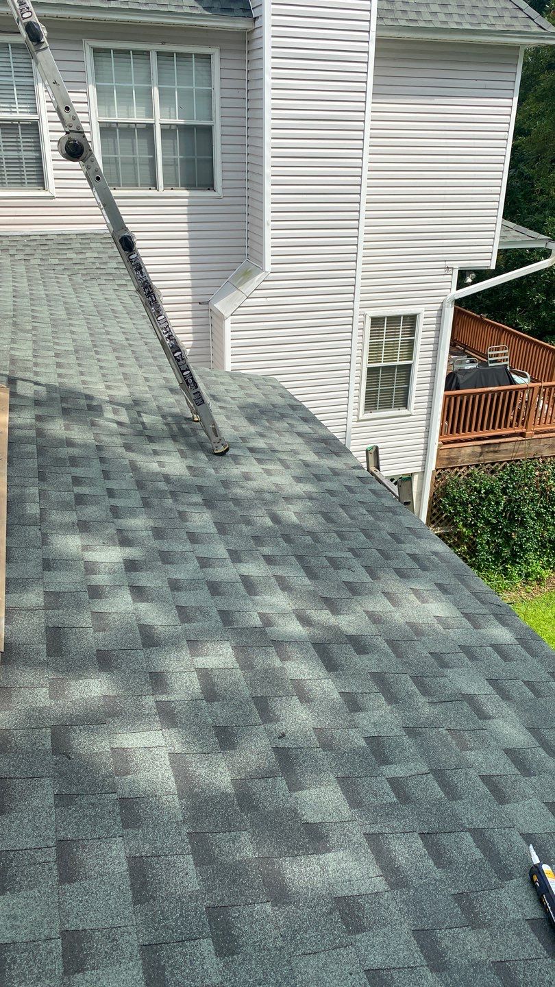 Residential Roofing Installation using Roof Replacement by American Roofing & Construction LLC
