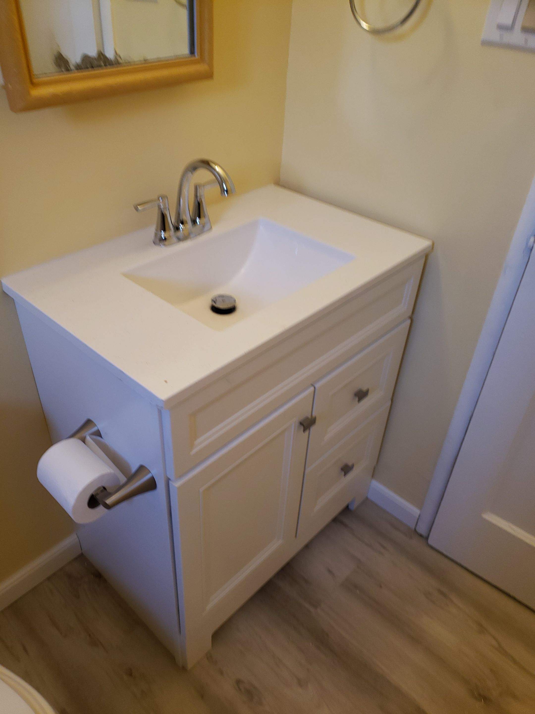 Studs to Stunning: Bathroom Remodel with FlexStone by McCray's Handyman, Inc.