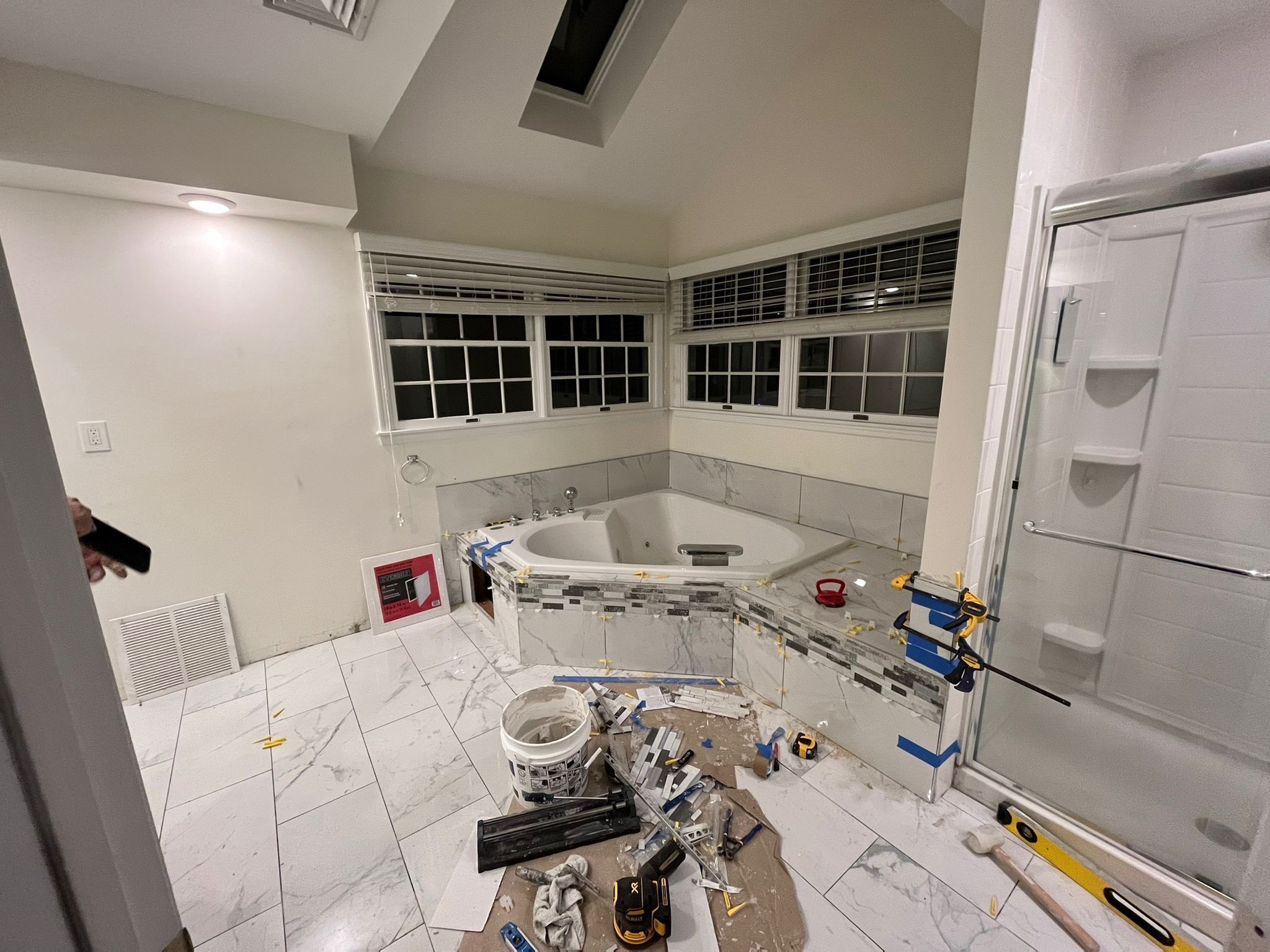 Bathroom Remodel using Tile by Home Concepts Construction