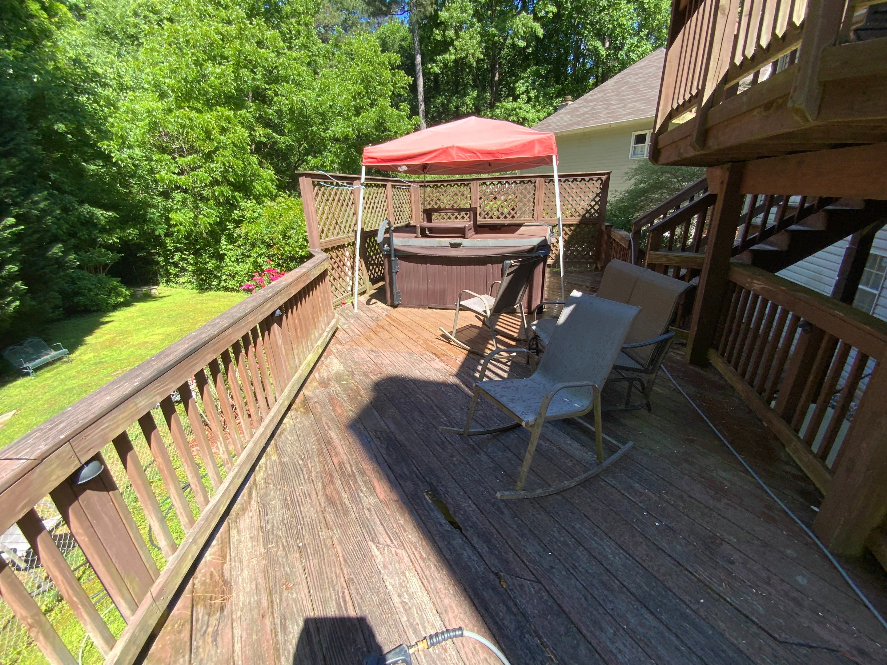 Multi-Level Wood Deck Repair and Staining in Tucker, Georgia by Swift Home Renovations