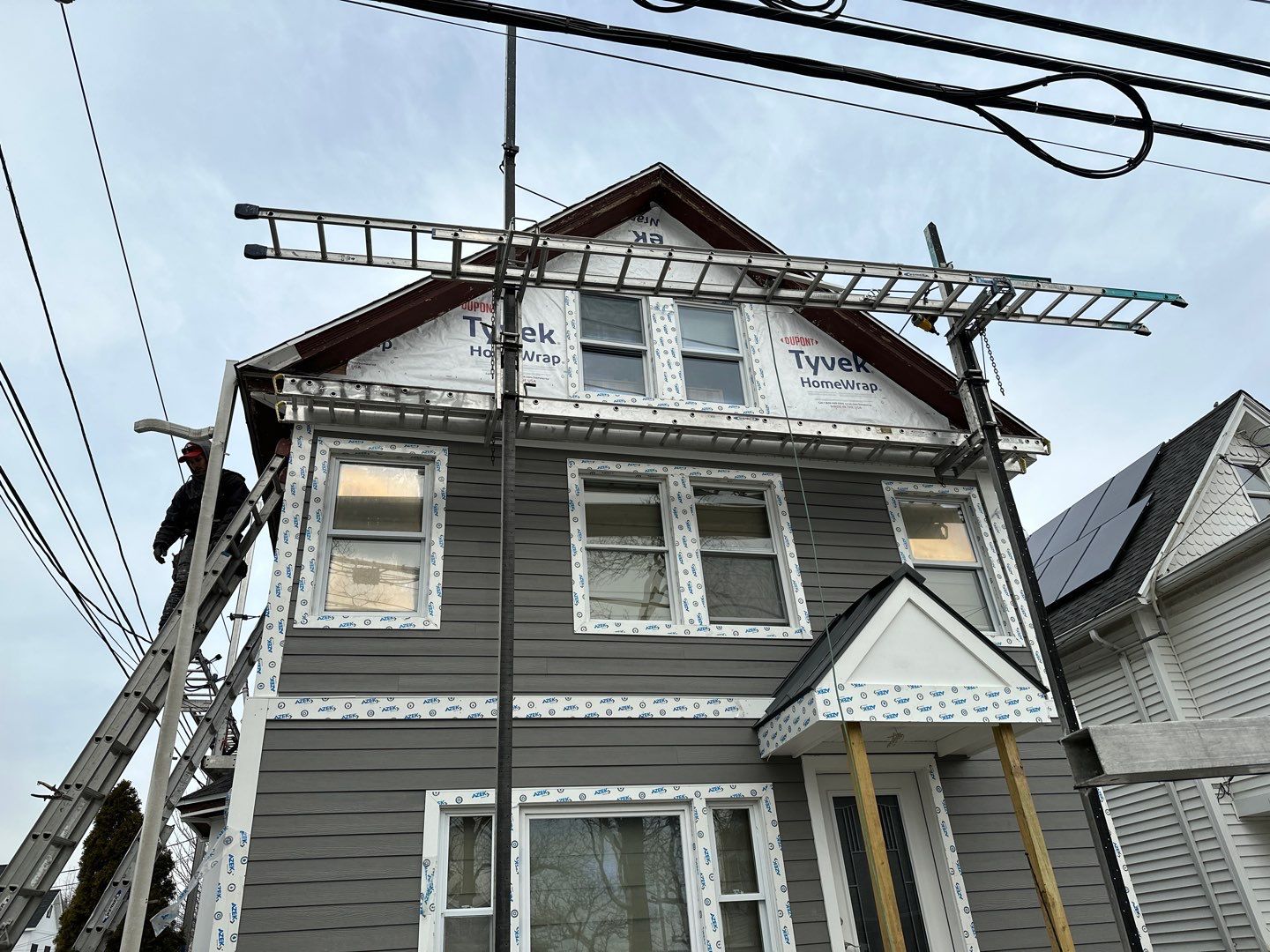 Siding Installation using Hardie Plank Aged Pewter by A Plus Exterior