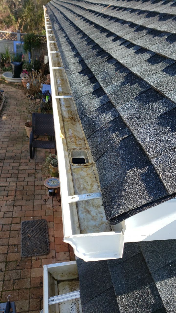 Gutter Cleaning using water by Power Wash Masters LLC