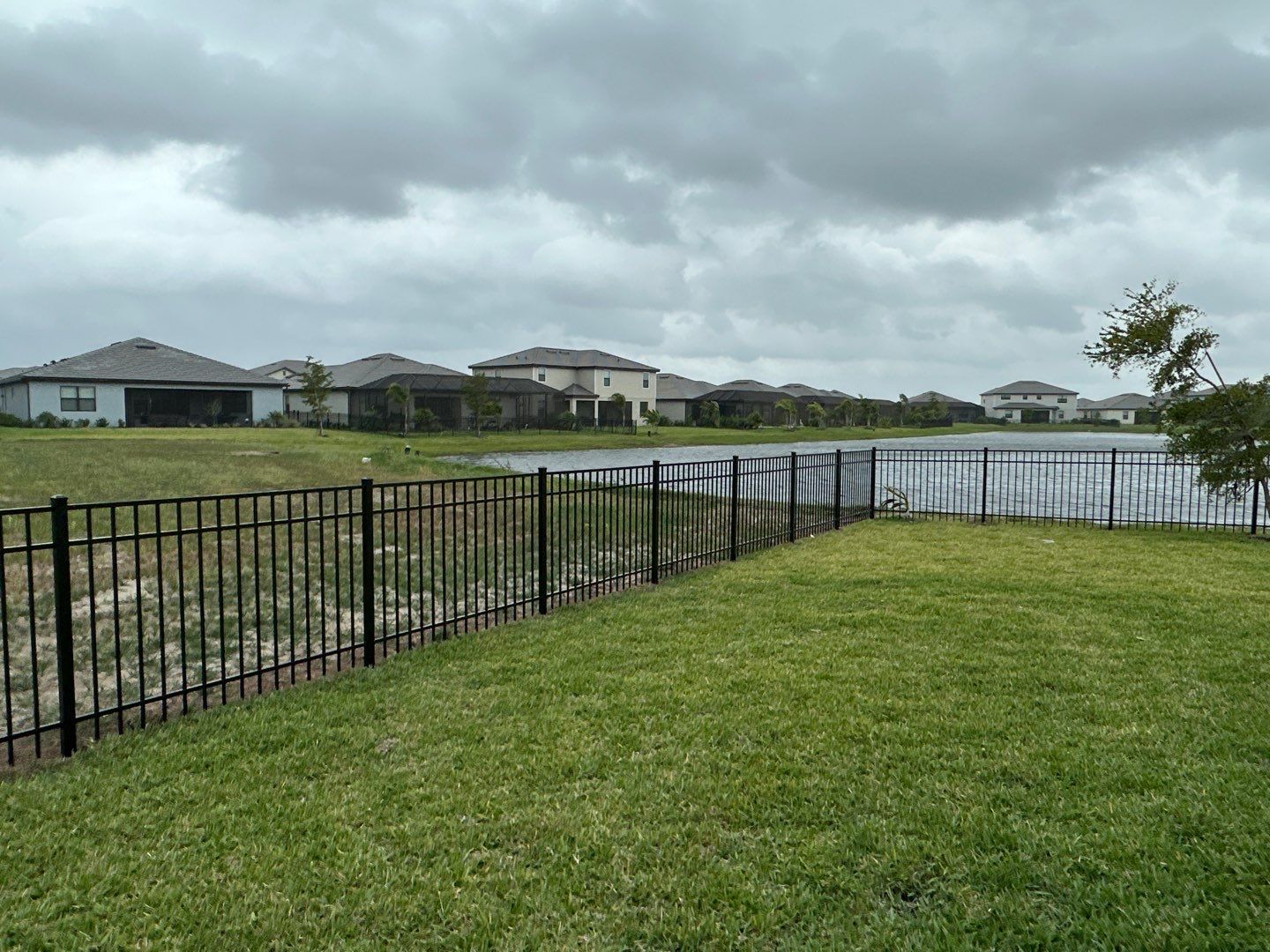 Aluminum Fence Installation using Black 3 Rail Aluminum Fence by Asap fence and gates, LLC