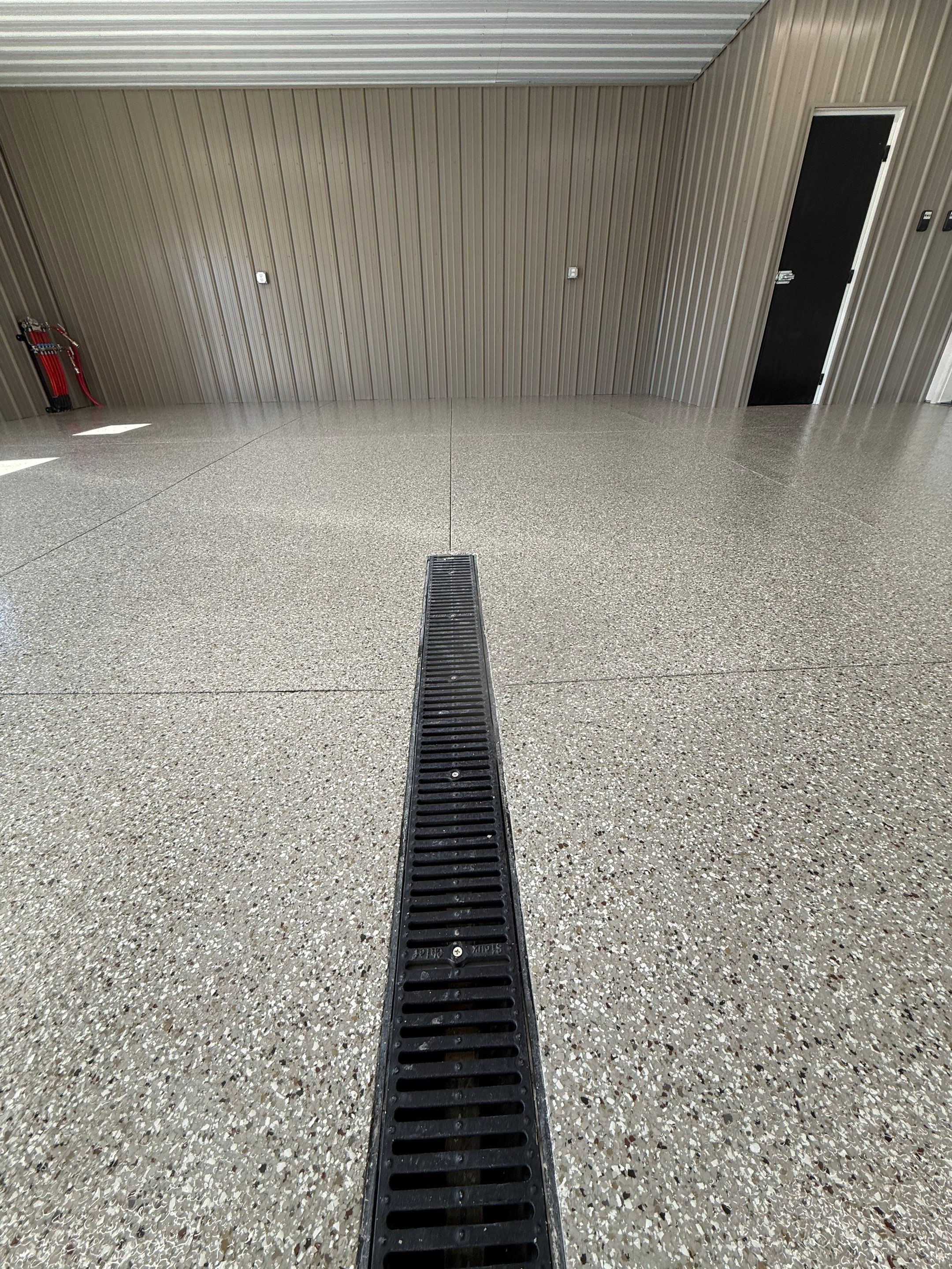 Creekbed Flake Coating in Woonsocket, SD by Select Painting, Coatings & Garage Cabinets