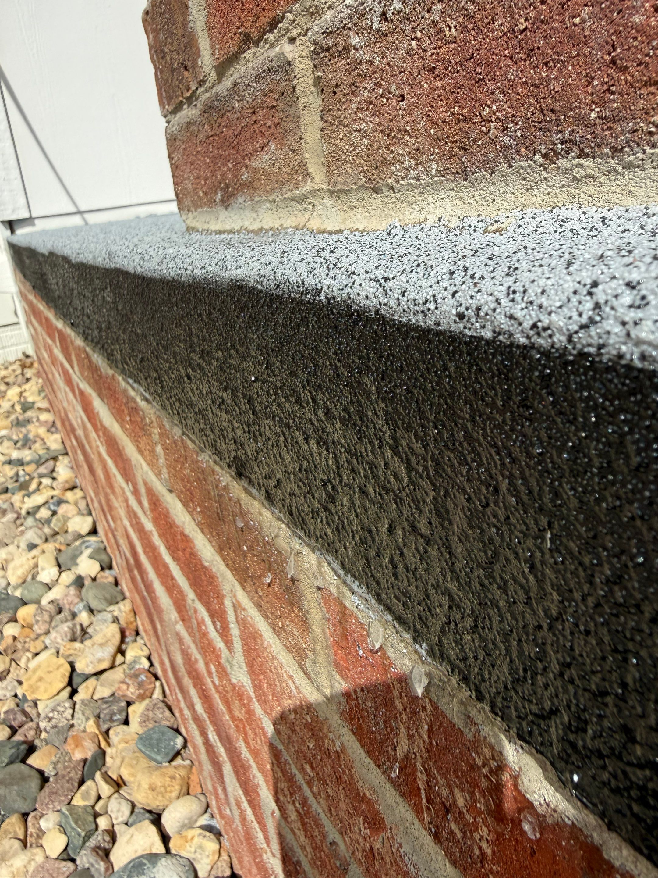 Grey Speckled Concrete Porch Coating for Sioux Falls Home by Select Painting, Coatings & Garage Cabinets