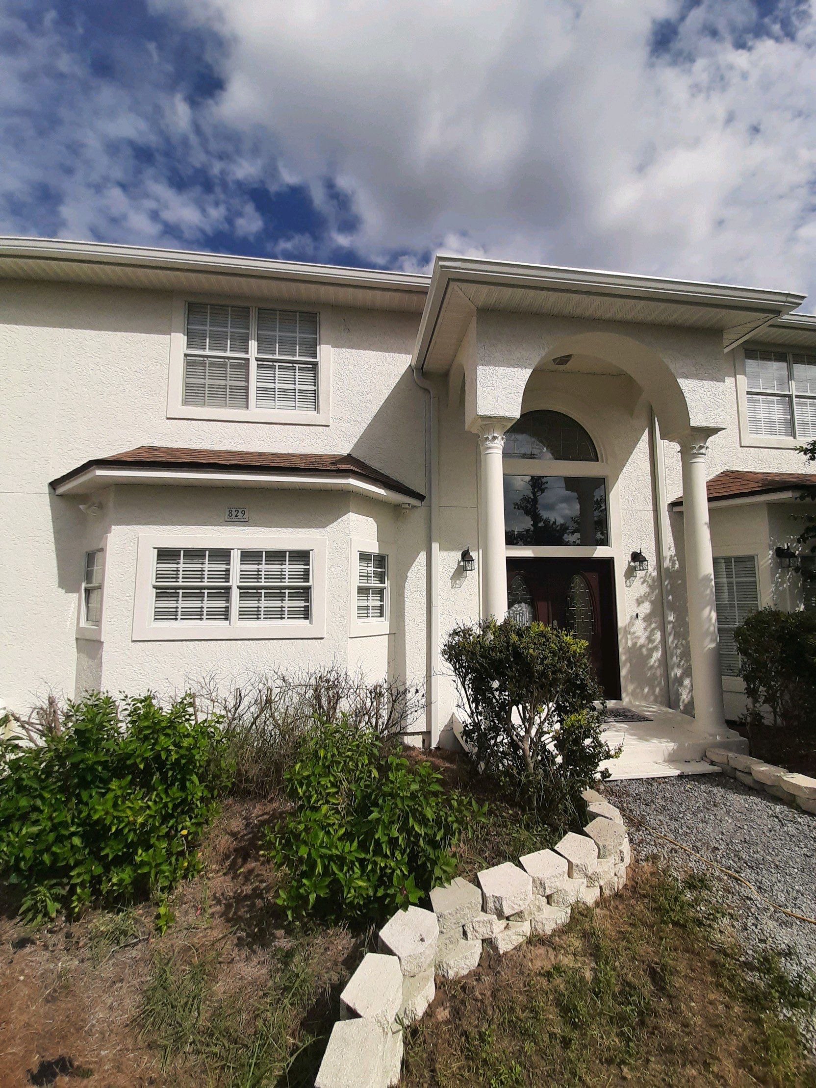 Seamless Gutter Installation using White K-Style Gutters by Gutter Professors