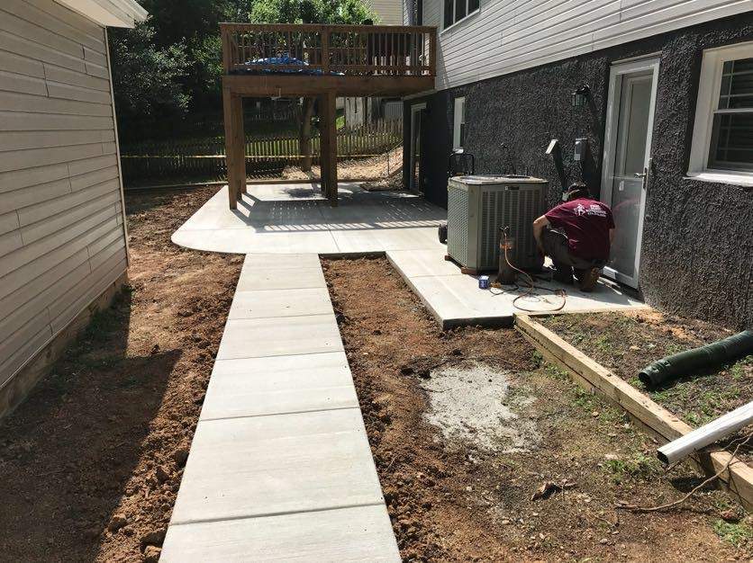 Exterior Repair using Concrete Pad/ walkway by Alpha Design Services