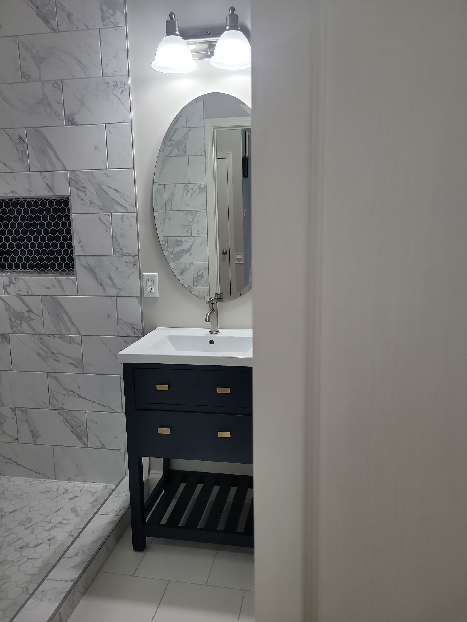 A Pathway to Possibility – Turning a Half Bath into a Full Retreat in Holly Springs by Elite Remodeling and Design LLC