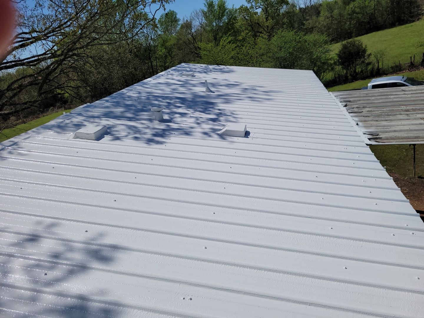 Commercial Roofing Installation using Aldocoat Coatings by Hostetler Roofing