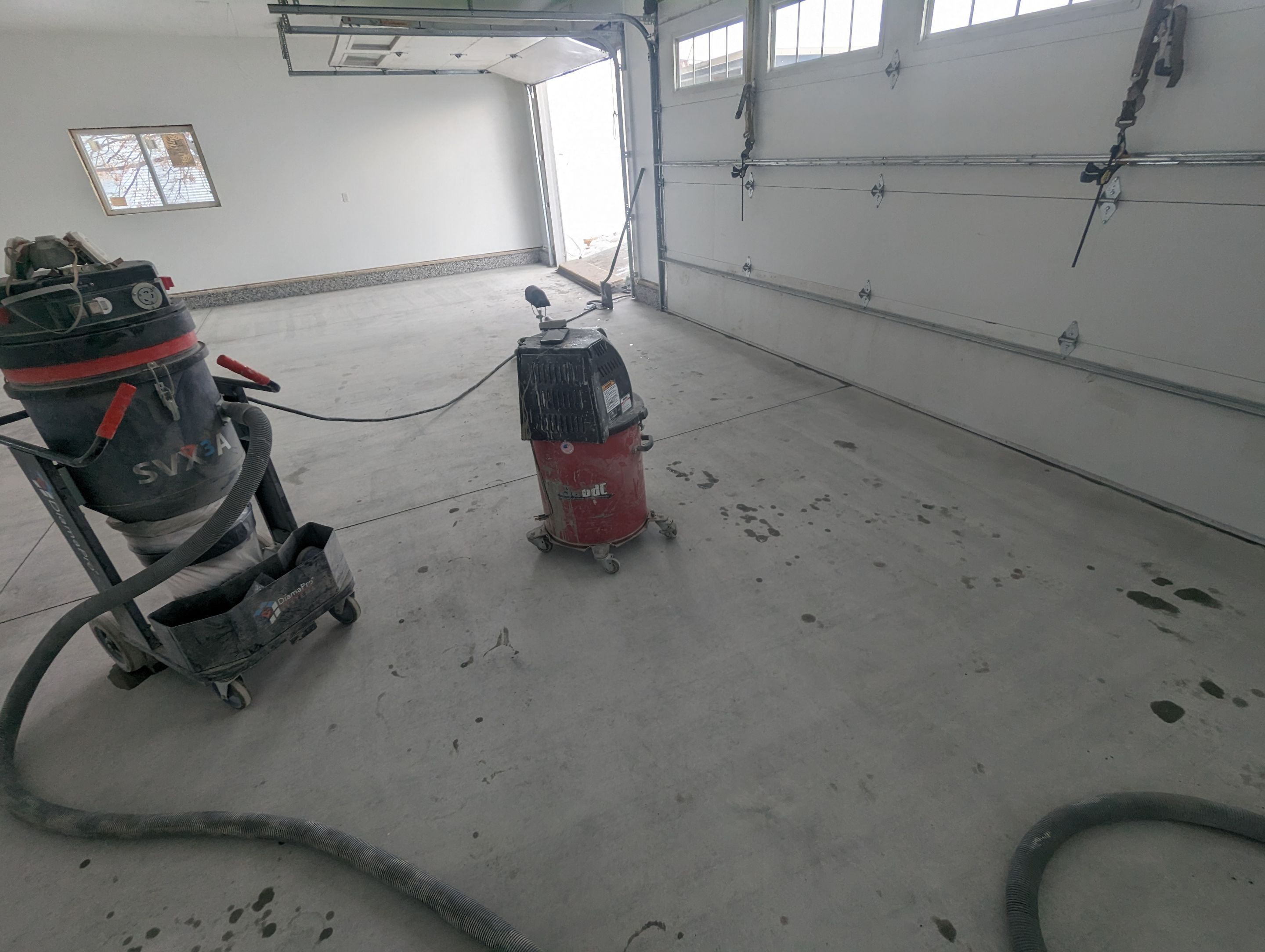 Garage using Domino  by Select Painting, Coatings & Garage Cabinets