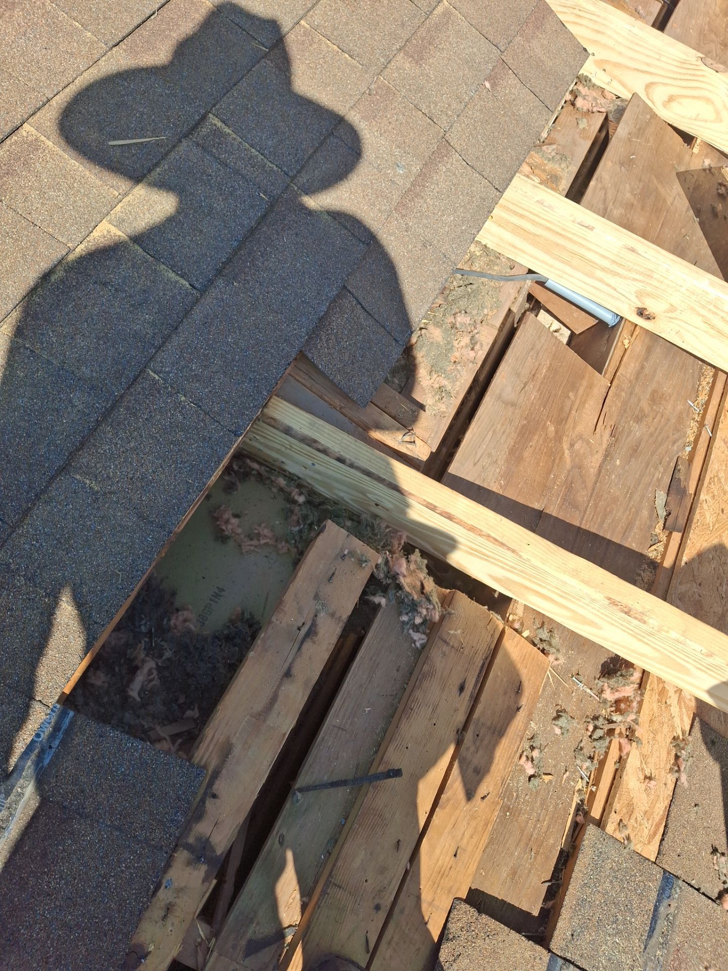 Chimneys need a Cricket.  by Bayfront Roofing and Construction