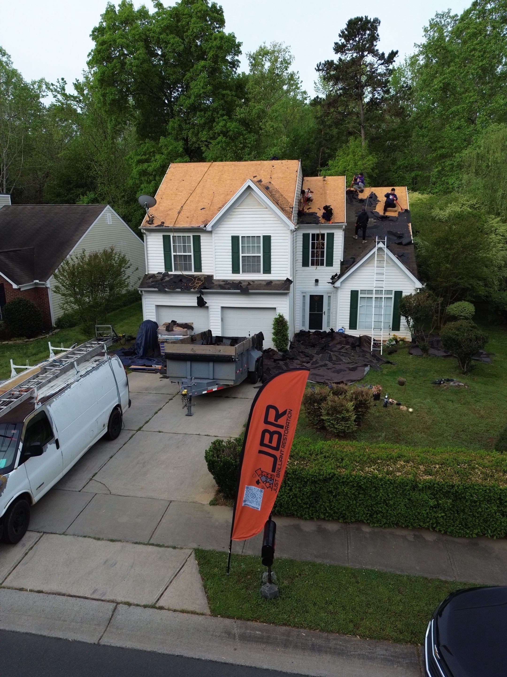 Roof and gutter replacement by hail and wind damage by Just Brilliant Restoration JBR