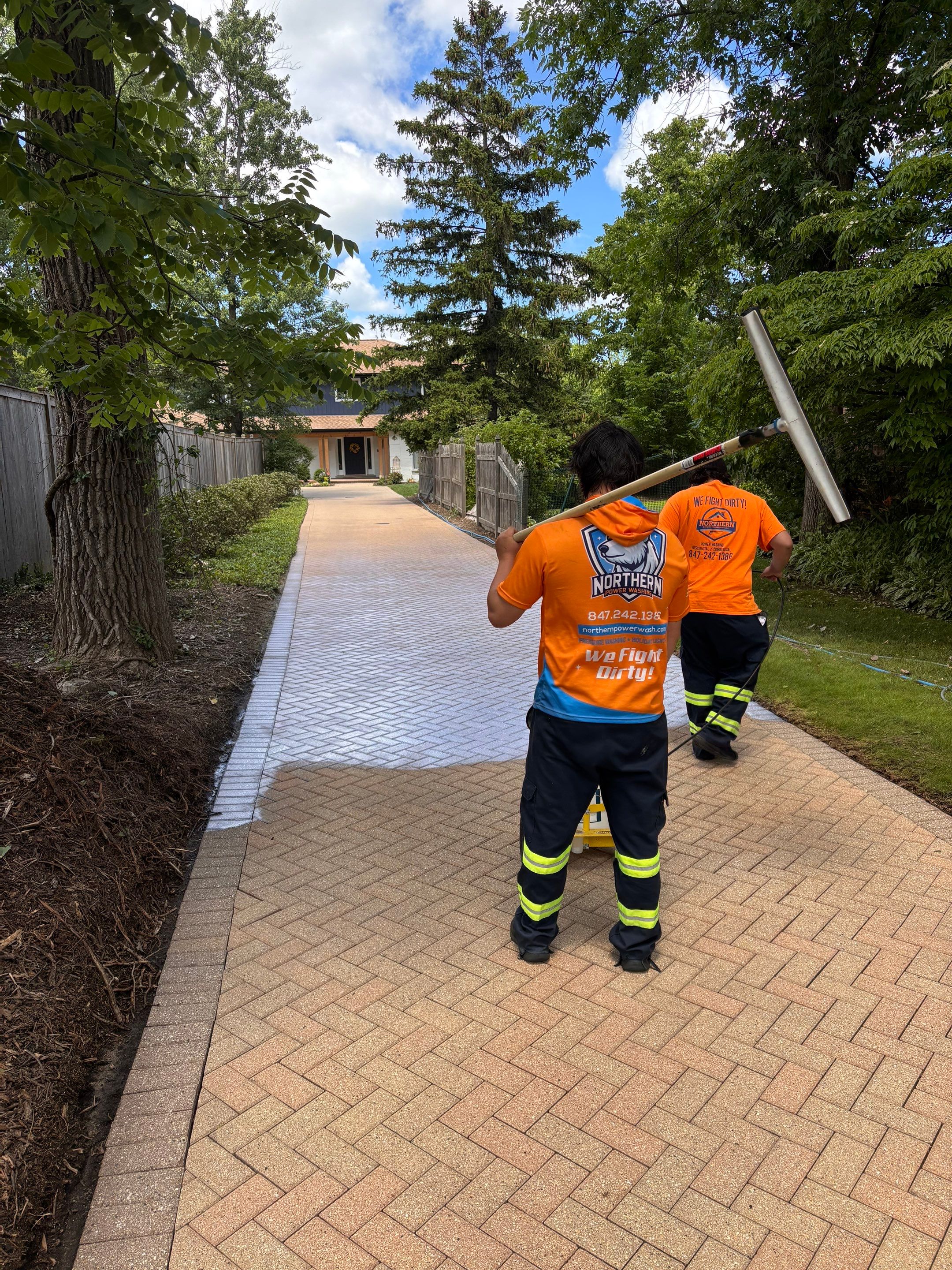 Brick paver repair, cleaning and sealing by Northern Power Washing LLC.