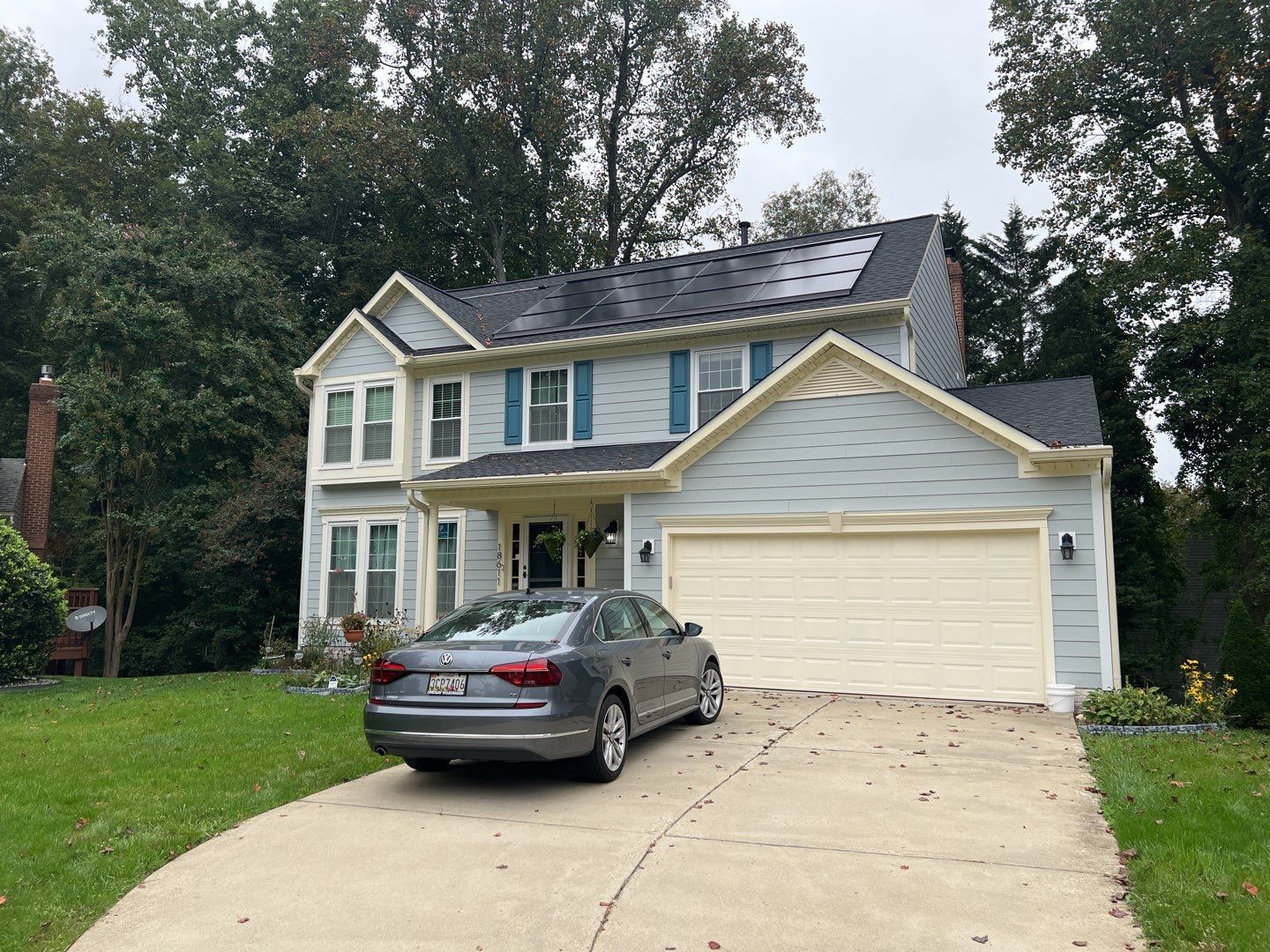 Exterior Home Makeover using GAF Timberline HDZ, GAF Decotech, and James Hardie Siding by American Home Contractors