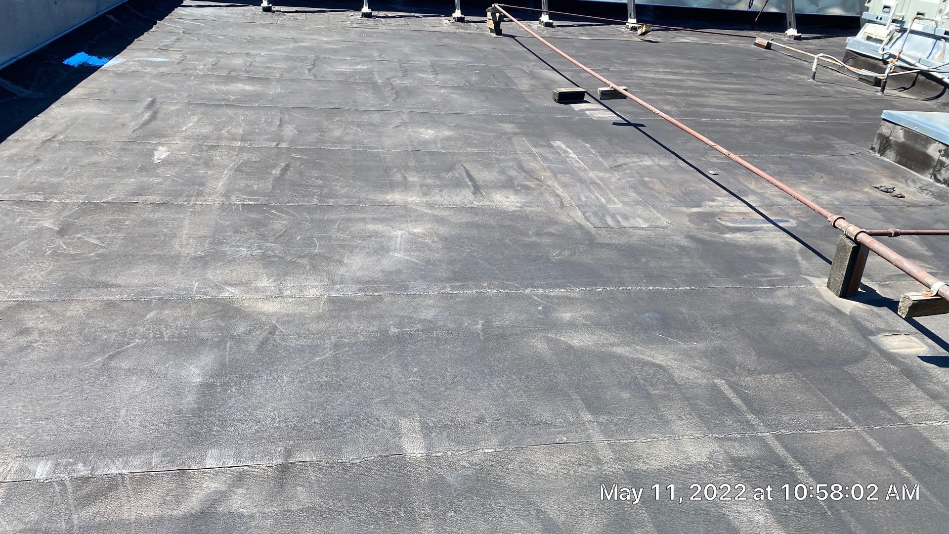 Commercial Roof Coating using Fiberseal basecoat and Silicon Topcoat by Just In Time Roofing and Restoration