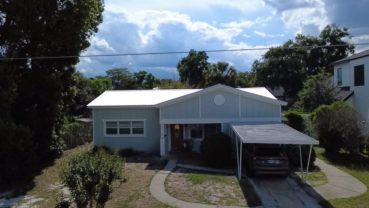 Metal Roof Project in Winter Park, FL by Gravity Roofing LLC