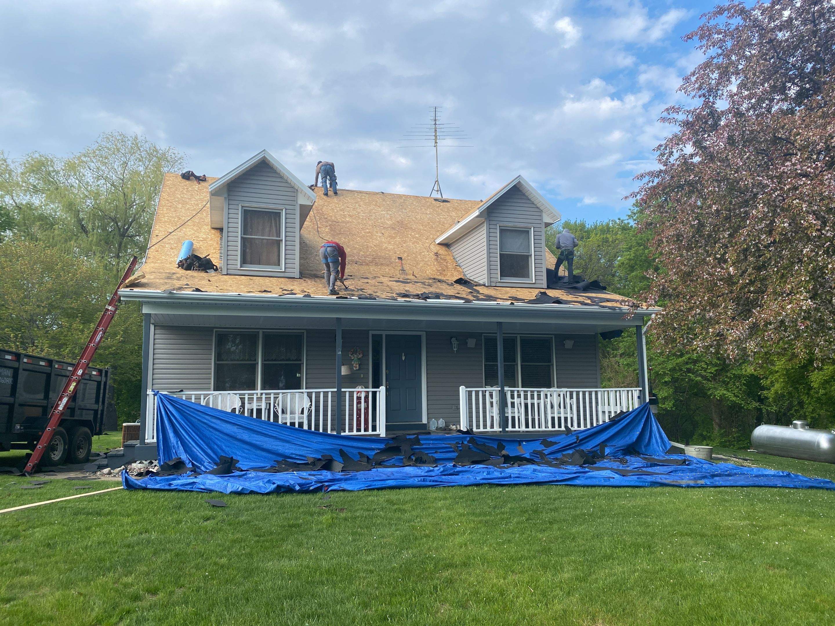 Residential Roofing Installation using Certainteed Landmark Moire Black by MODERN EXTERIOR SYSTEMS