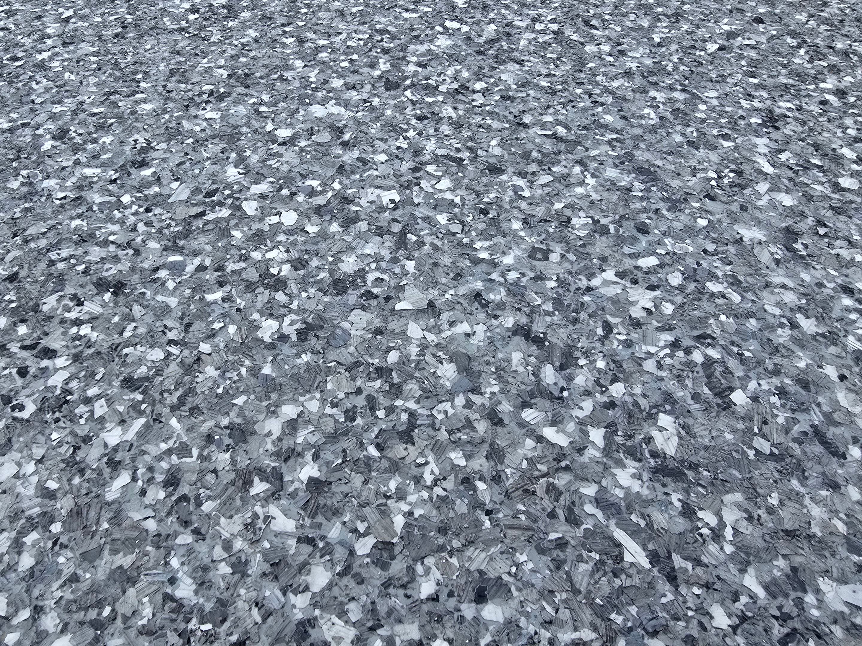 Driveway Using Weathered Gray with the Border in Nightfall by Elite Floor Solutions