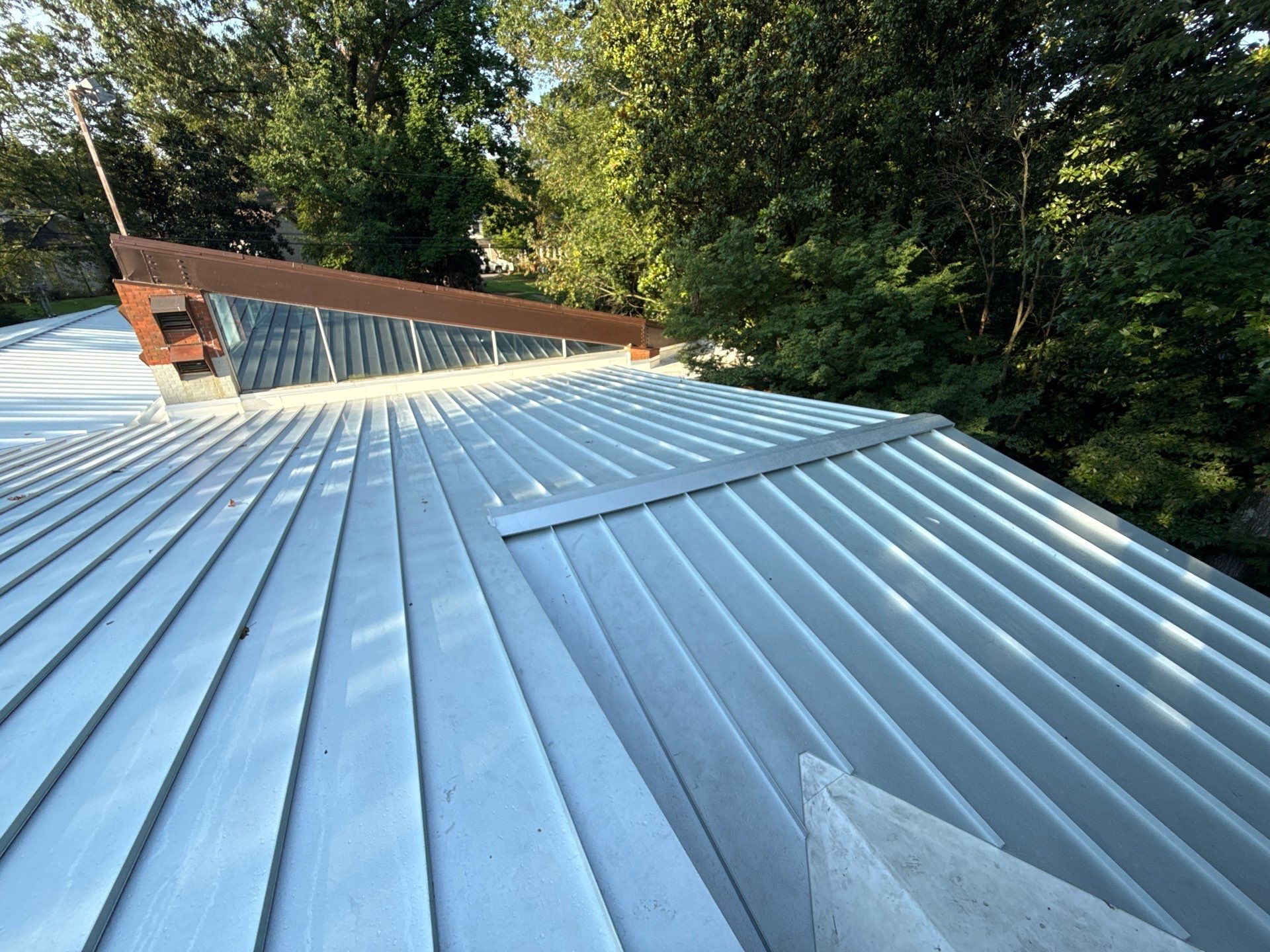 Residential Standing Seam Metal Roof and Membrane Replacement in Memphis by Revival Roofing Services