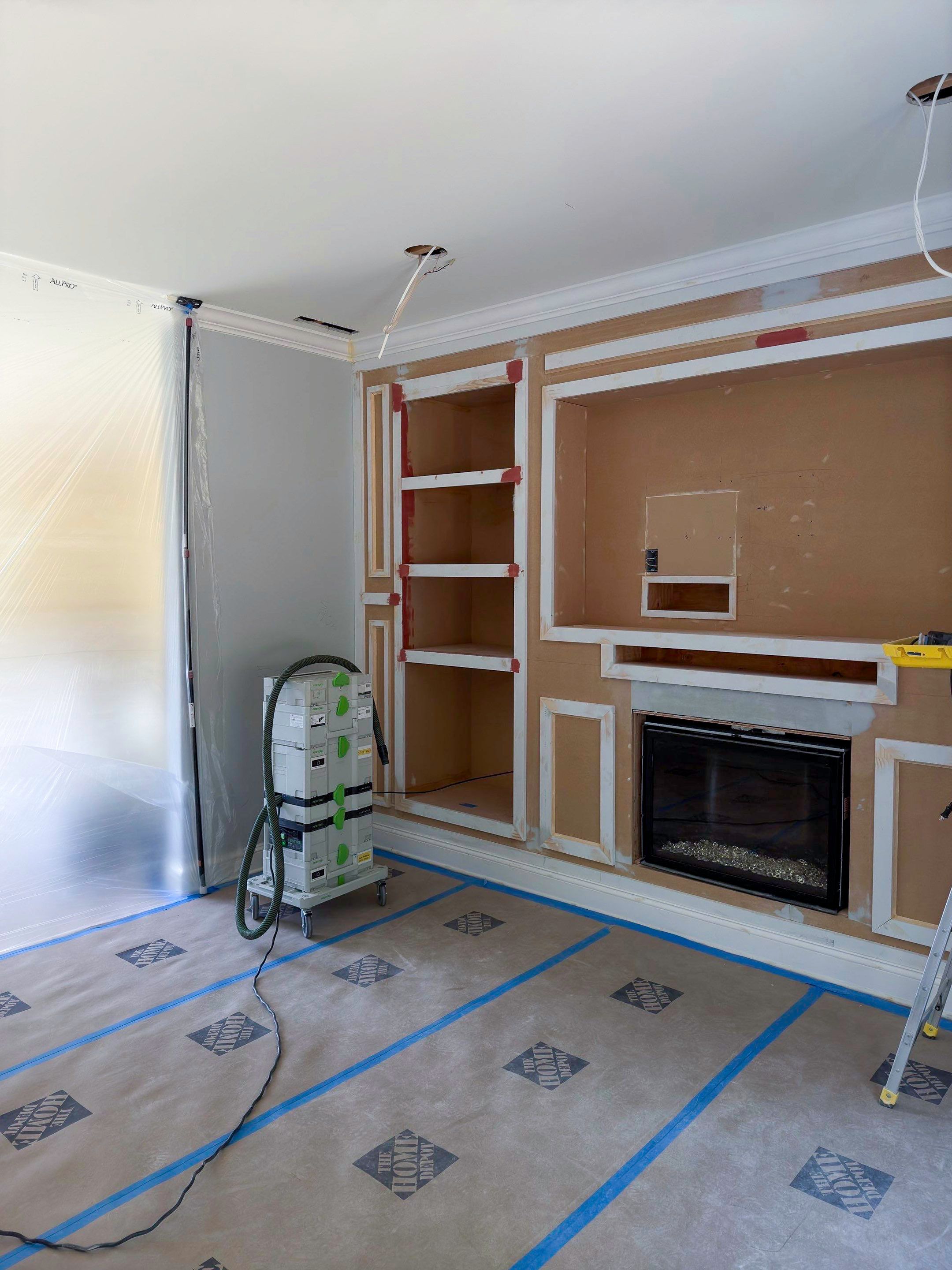 Built-in TV unit by Trendy Walls Inc.