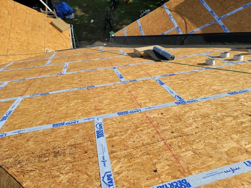 Residential Roofing Installation using Roof Replacement by American Roofing & Construction LLC