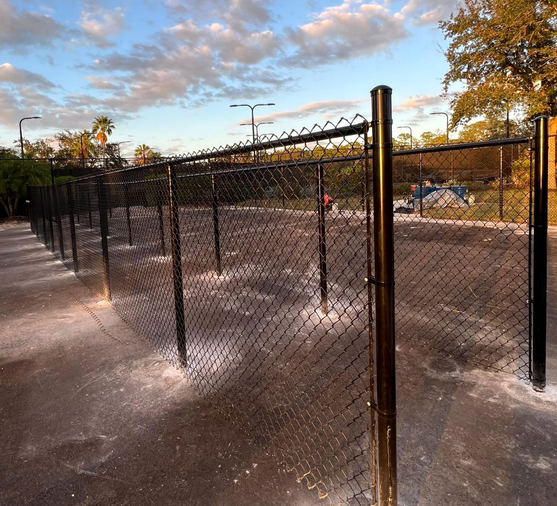 Chain-link Fence Installation using 8Ft Tall Black Chainlink Fence by Asap fence and gates, LLC