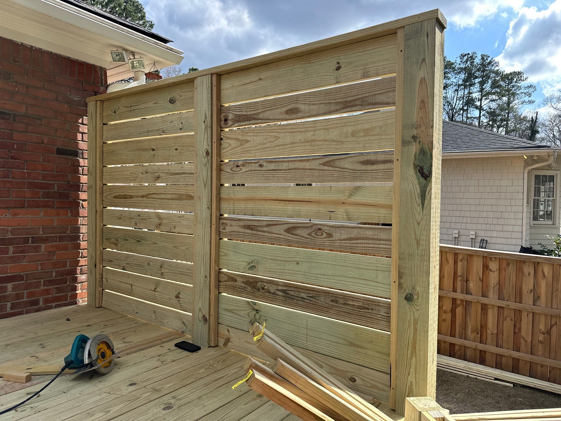 Wood Deck Resurface with Privacy Wall in Buckhead, GA by Nelson Exteriors
