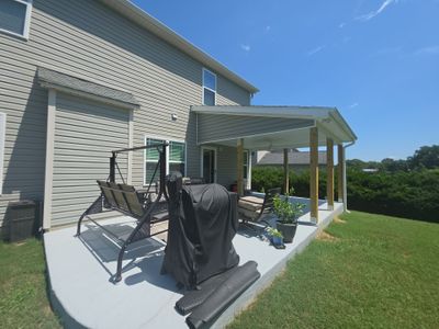 Covered Patio Roof Construction with Architectural Shingles in Garner