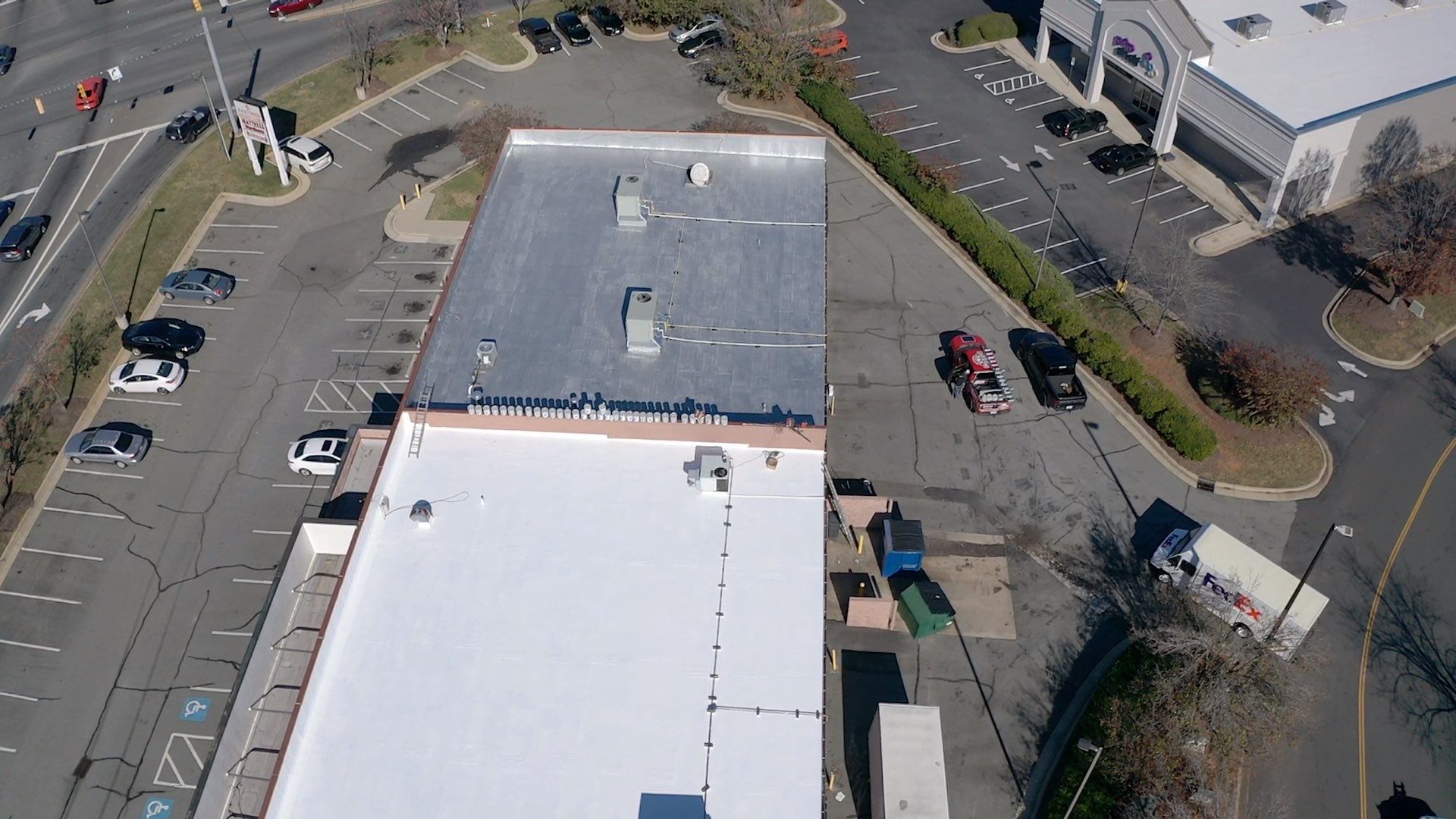 Commercial Coating using Poly Urerthane and Silicone Coating by Just In Time Roofing and Restoration