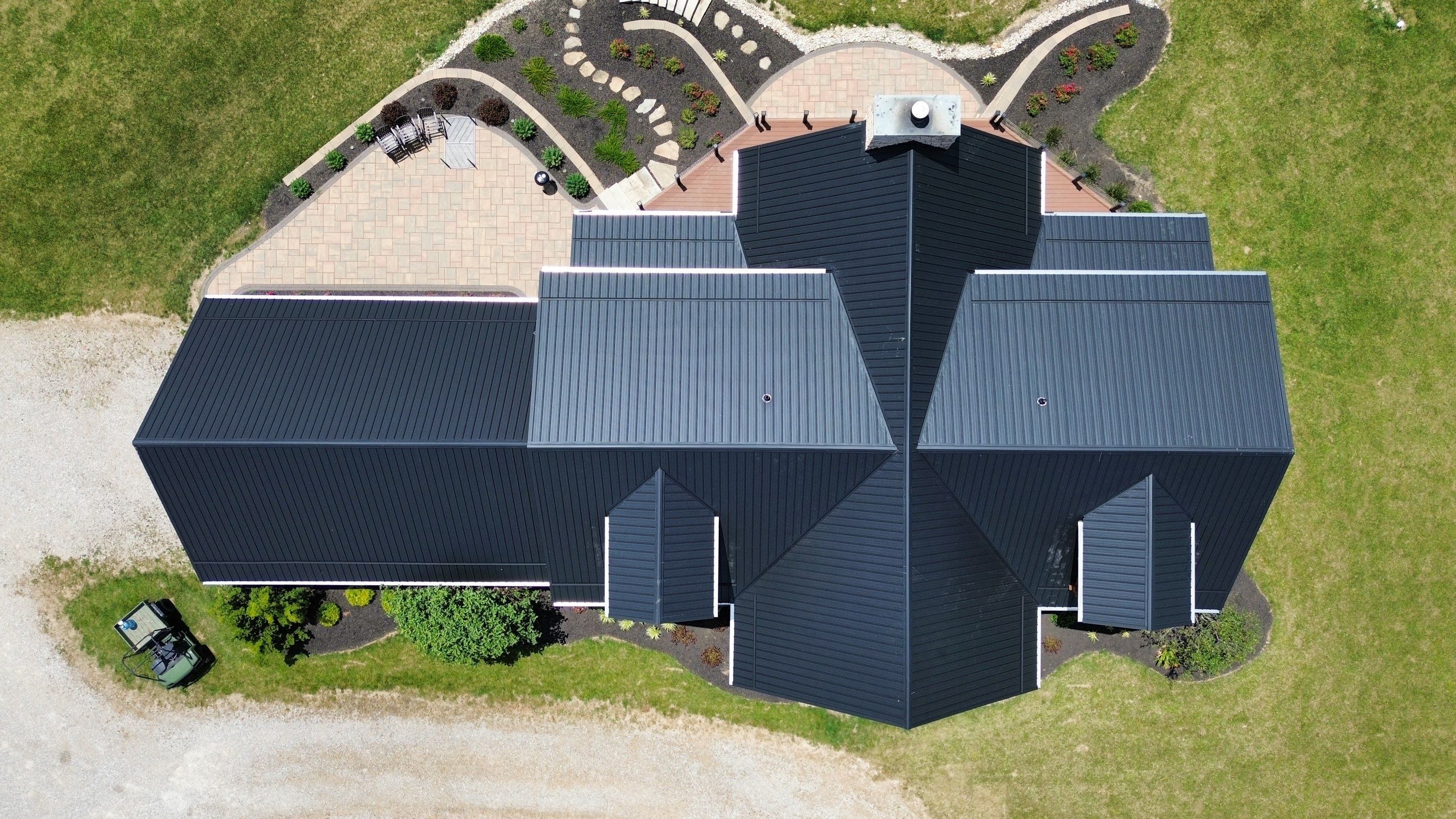 Residential Roofing Installation using Performance Panel Metal - Frost Black by RoofX 