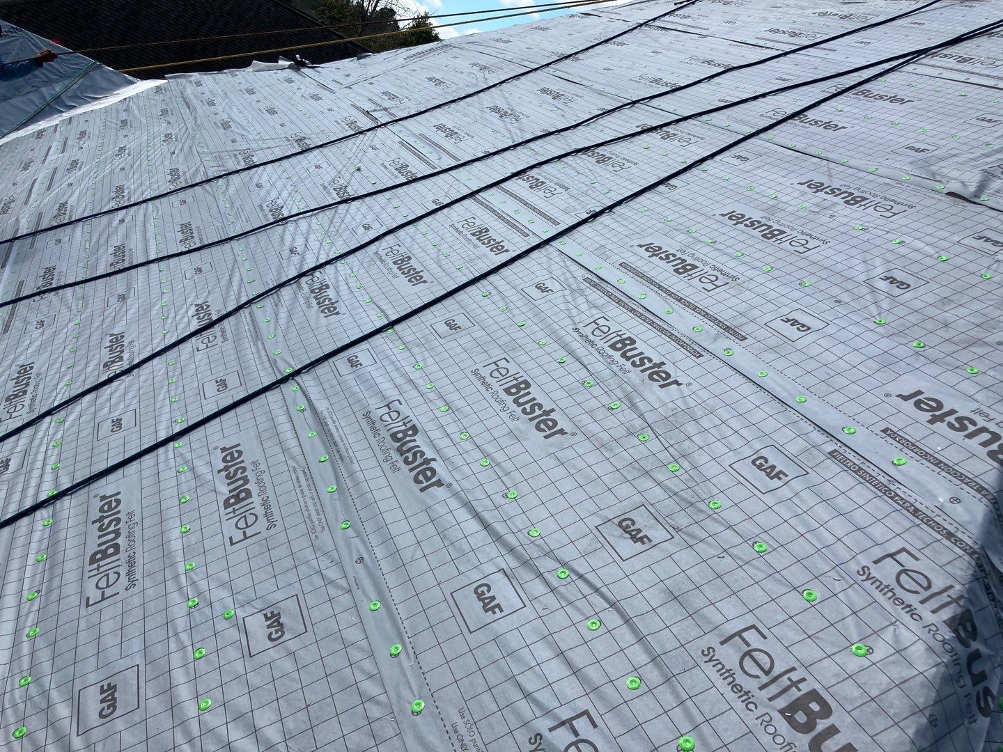 Residential Roofing Installation using Roof Replacement by American Roofing & Construction LLC