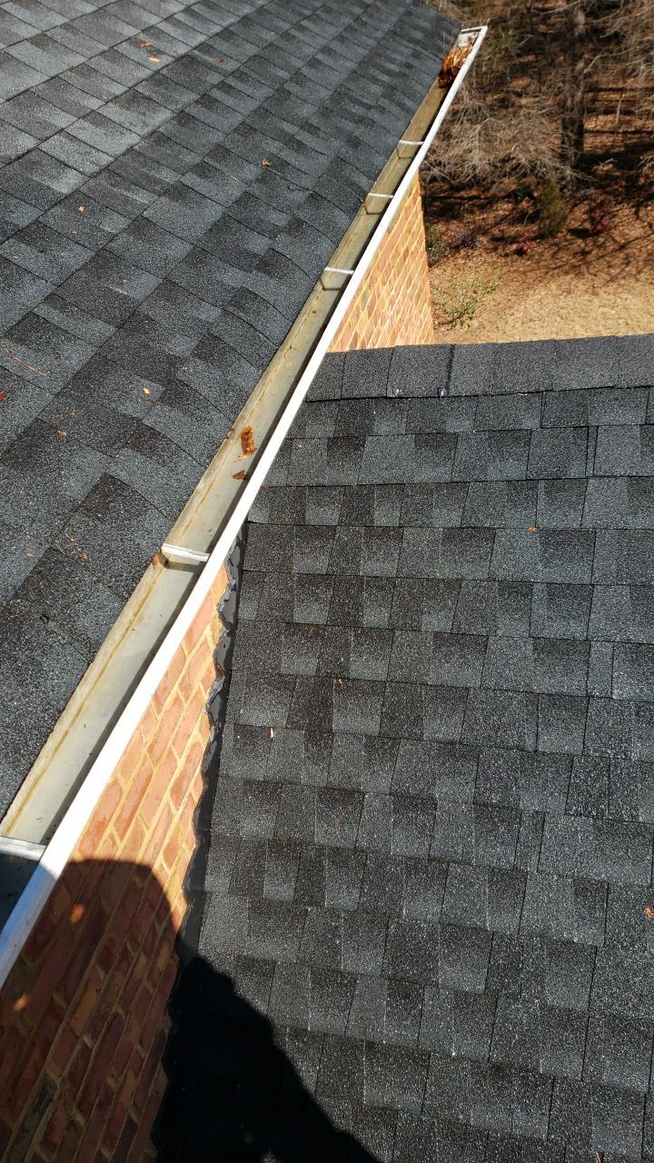 Gutter Cleaning using water by Power Wash Masters LLC