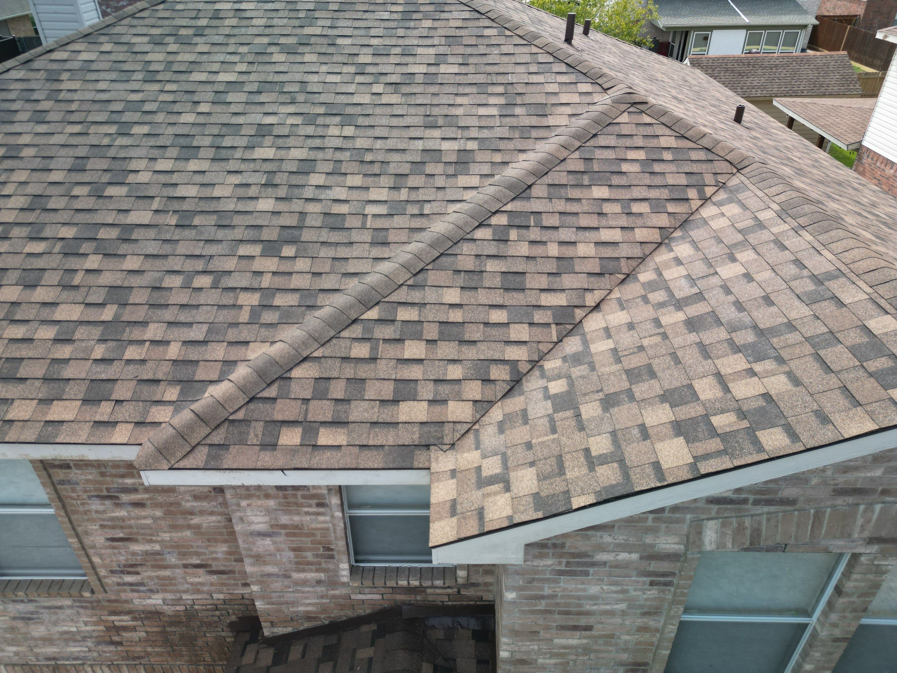Full Roof Replacement, Chimney Rebuild and Interior Damage Replacement by First United Roofing & Construction