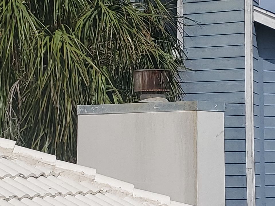 Chimney Cap & Chase Replacement using Custom Fabricated Steel by Lighthouse Roofing