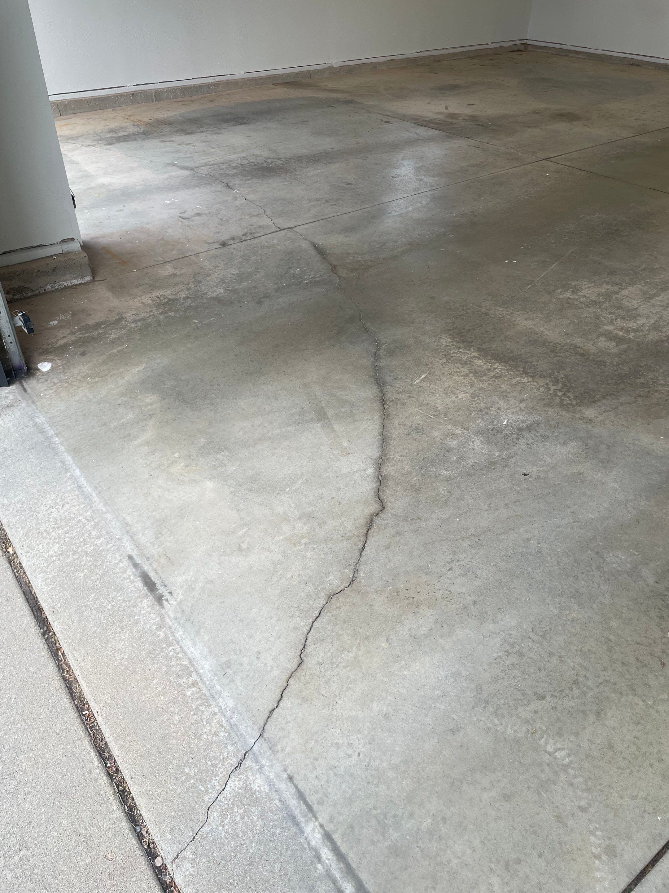 Multi-Car Garage Floor Coating and Crack Repair in Tea by Select Painting, Coatings & Garage Cabinets